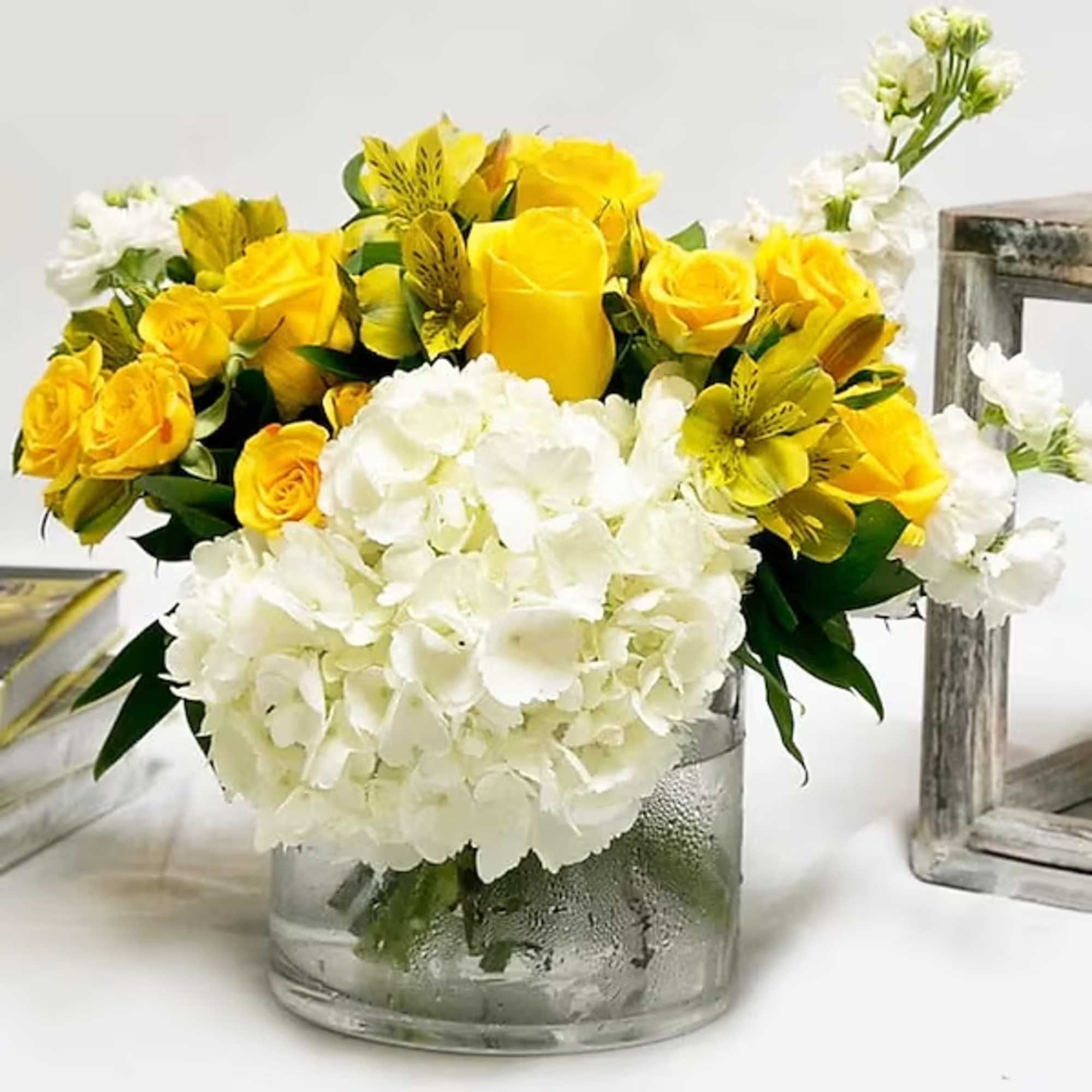 Some colors just renew us. This beautiful arrangement of yellow roses, alstroemeria