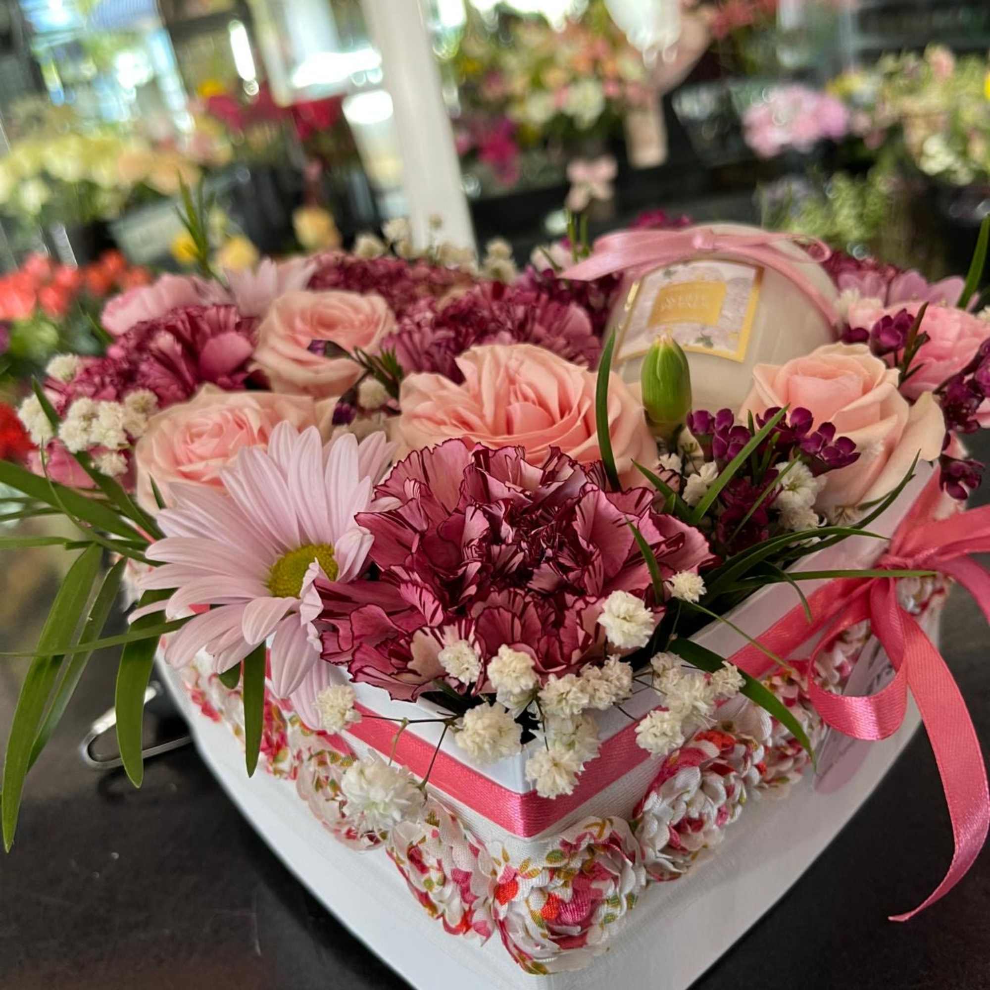 Surprise your recipient with this very special fresh cut heart box arrangement!