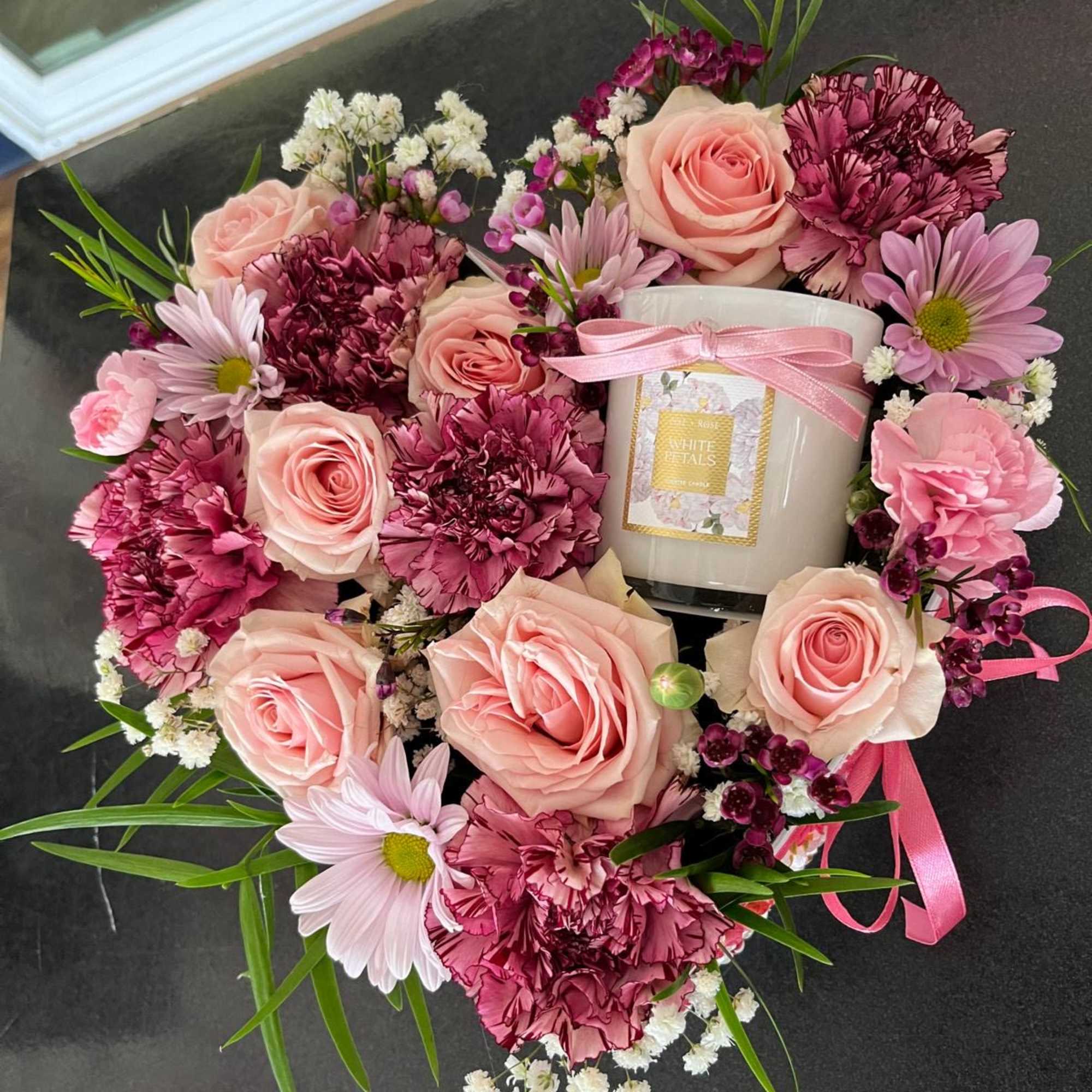 Surprise your recipient with this very special fresh cut heart box arrangement!