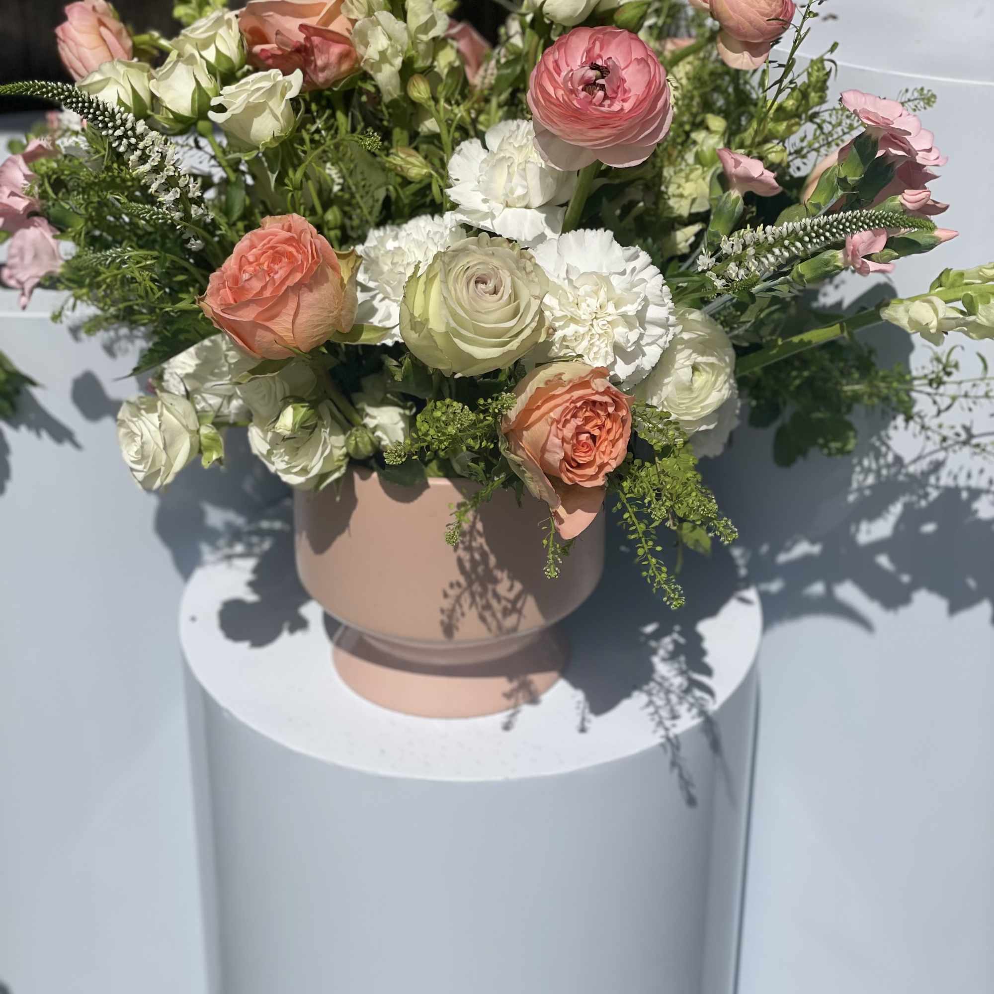 Lovely peach 6&quot; ceramic pot overflowing  with bright cream and peach