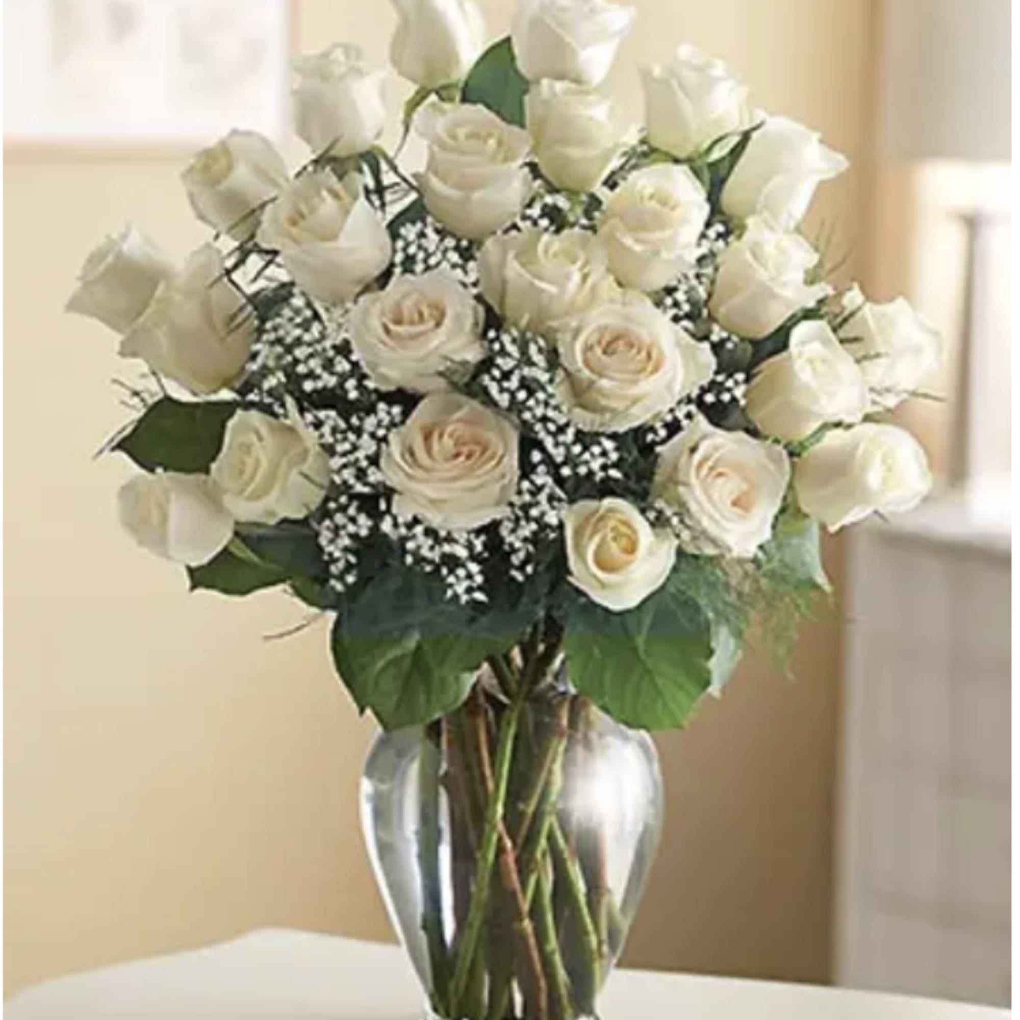 A dozen gorgeous white roses are the perfect romantic gift to send