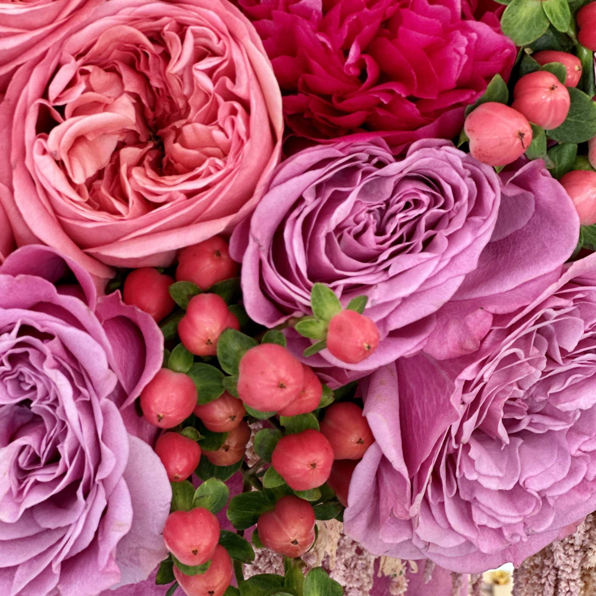 Introducing a luxurious velvet box overflowing with an opulent assortment of flowers