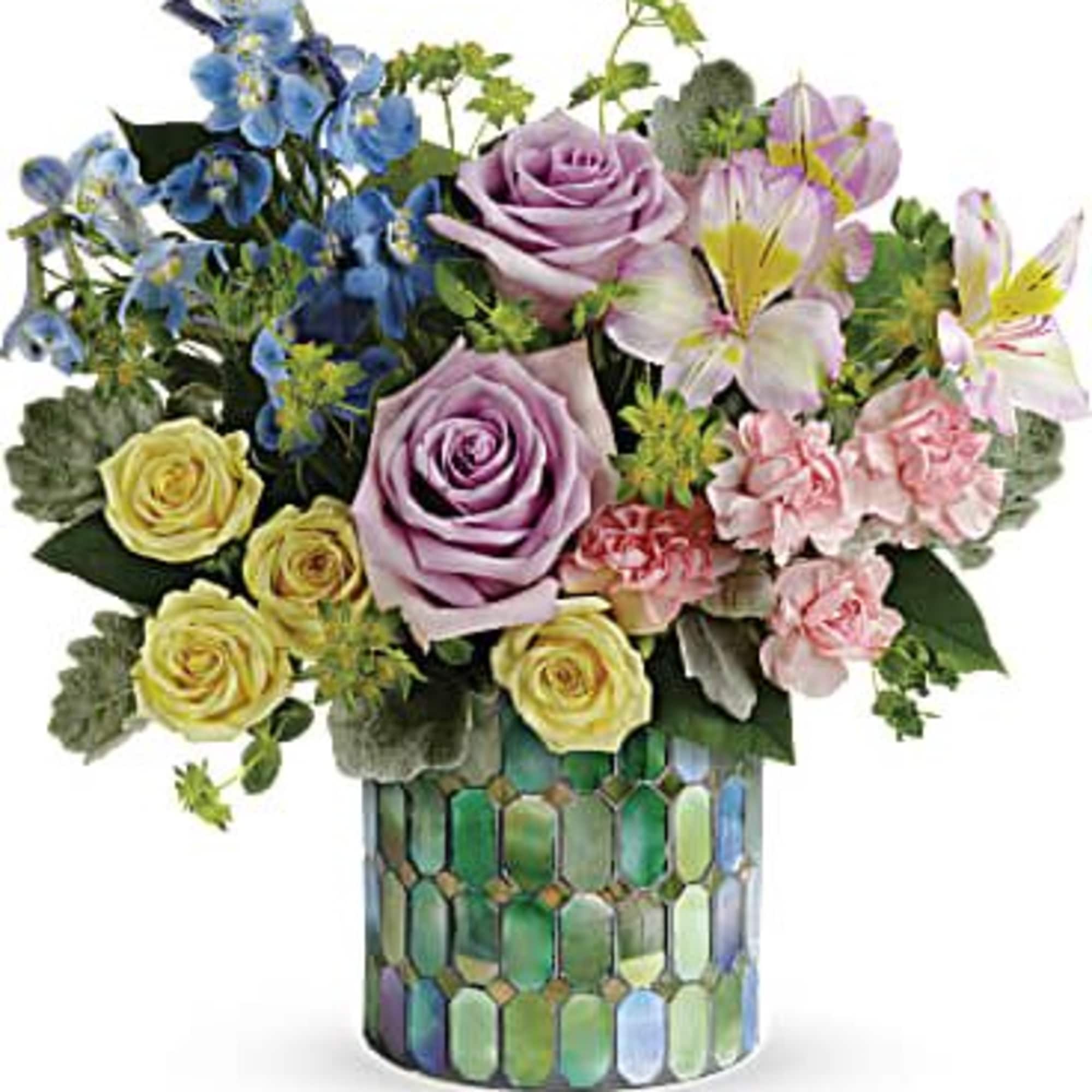 This alluring bouquet features lavender roses, light yellow spray roses, pink alstroemeria