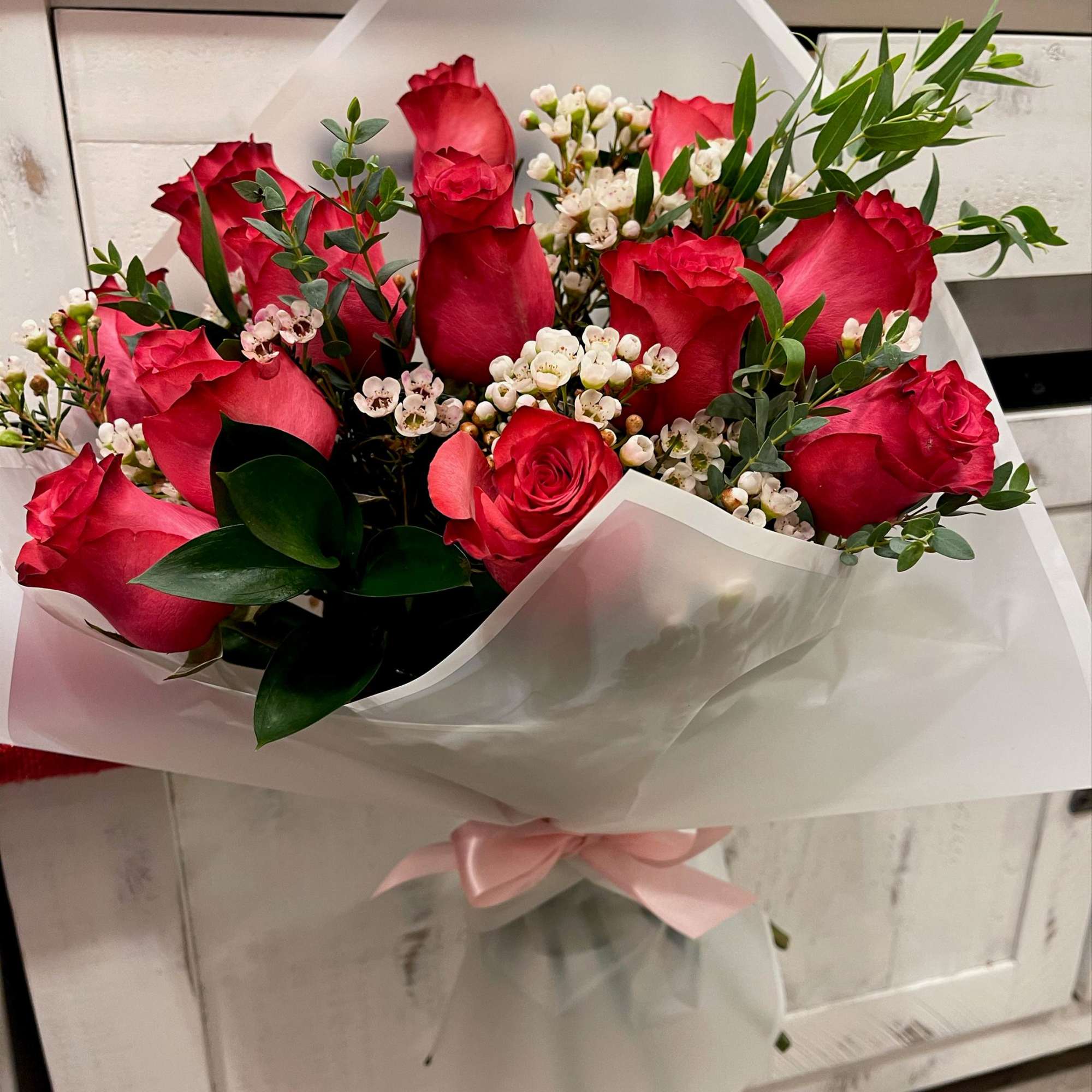 Standard: Dozen roses, No vase
Deluxe: 2 dozen roses, no vase 
Premium: 3