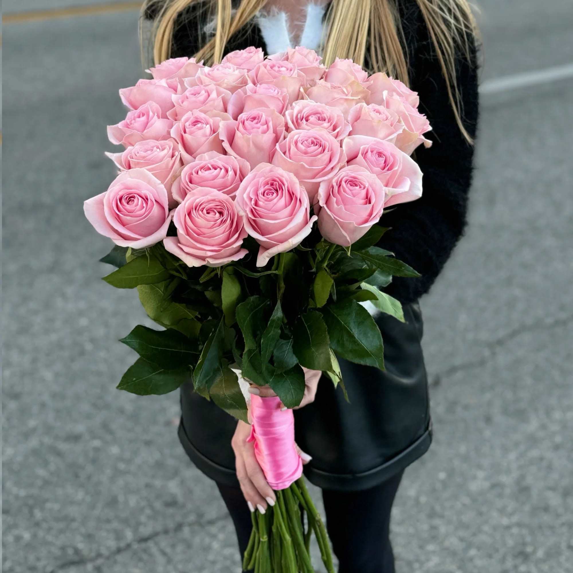 Delight in the charm of our pink roses arrangement, elegantly wrapped with
