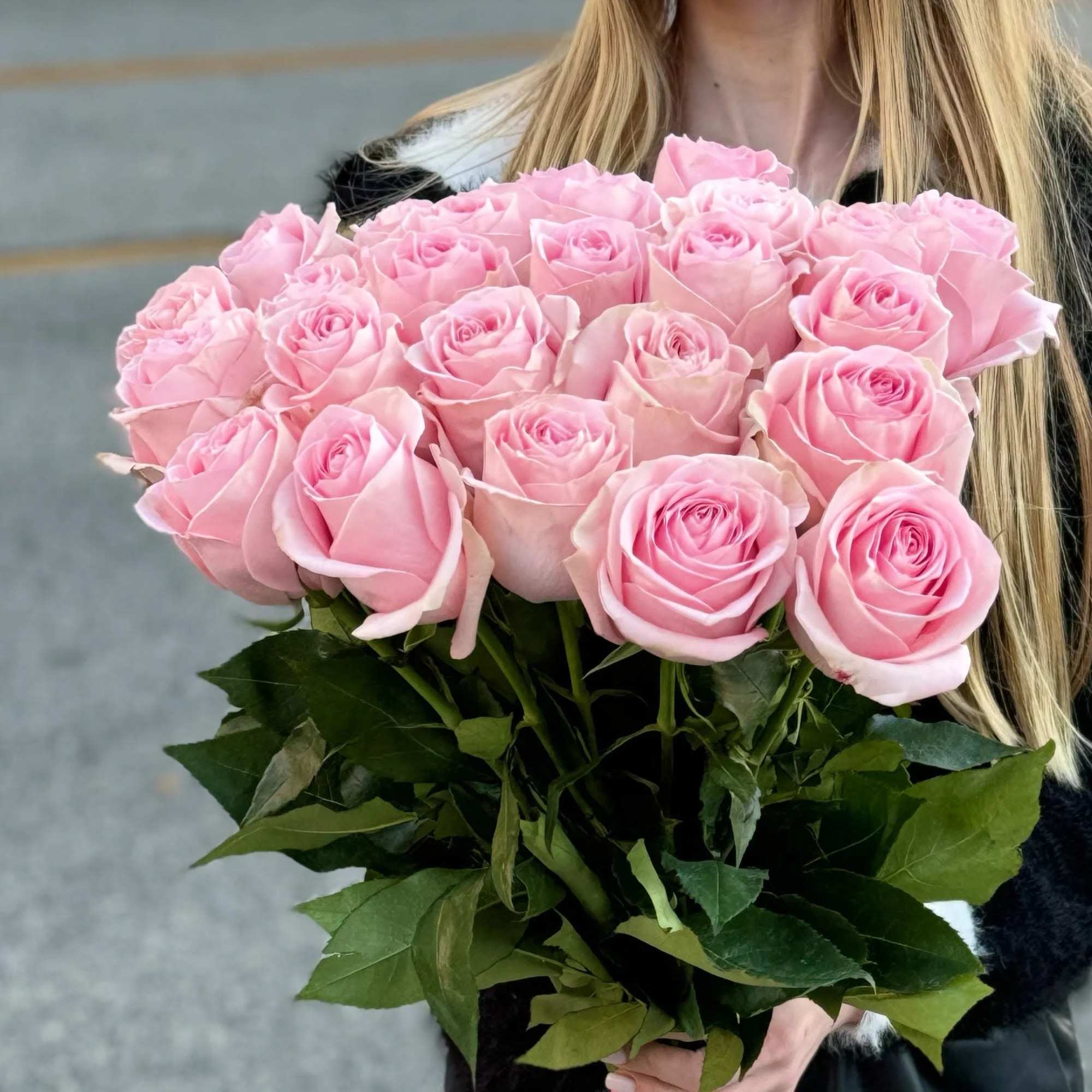 Delight in the charm of our pink roses arrangement, elegantly wrapped with