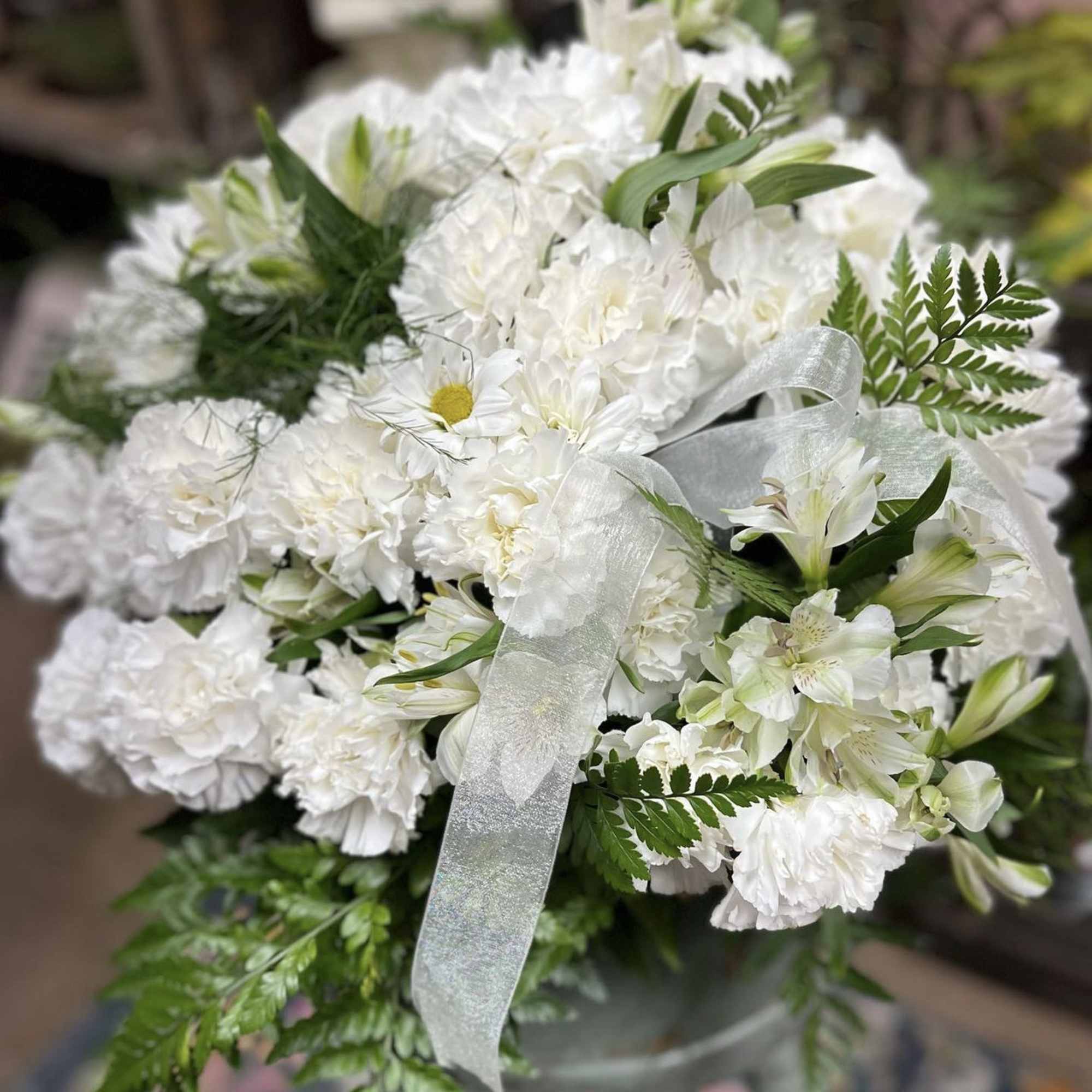 DESIGNERS CHOICE Array of All White Fresh Cut Florals place in a