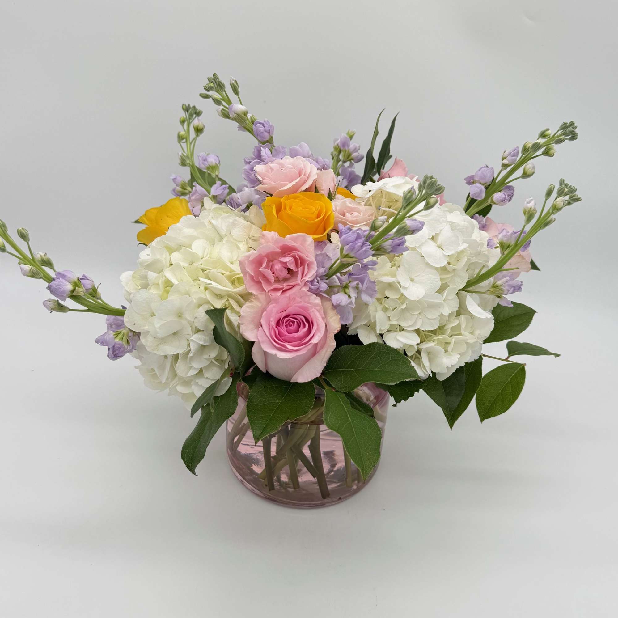 Delicate yet vibrant, Her Heart in Bloom combines romantic roses and dreamy