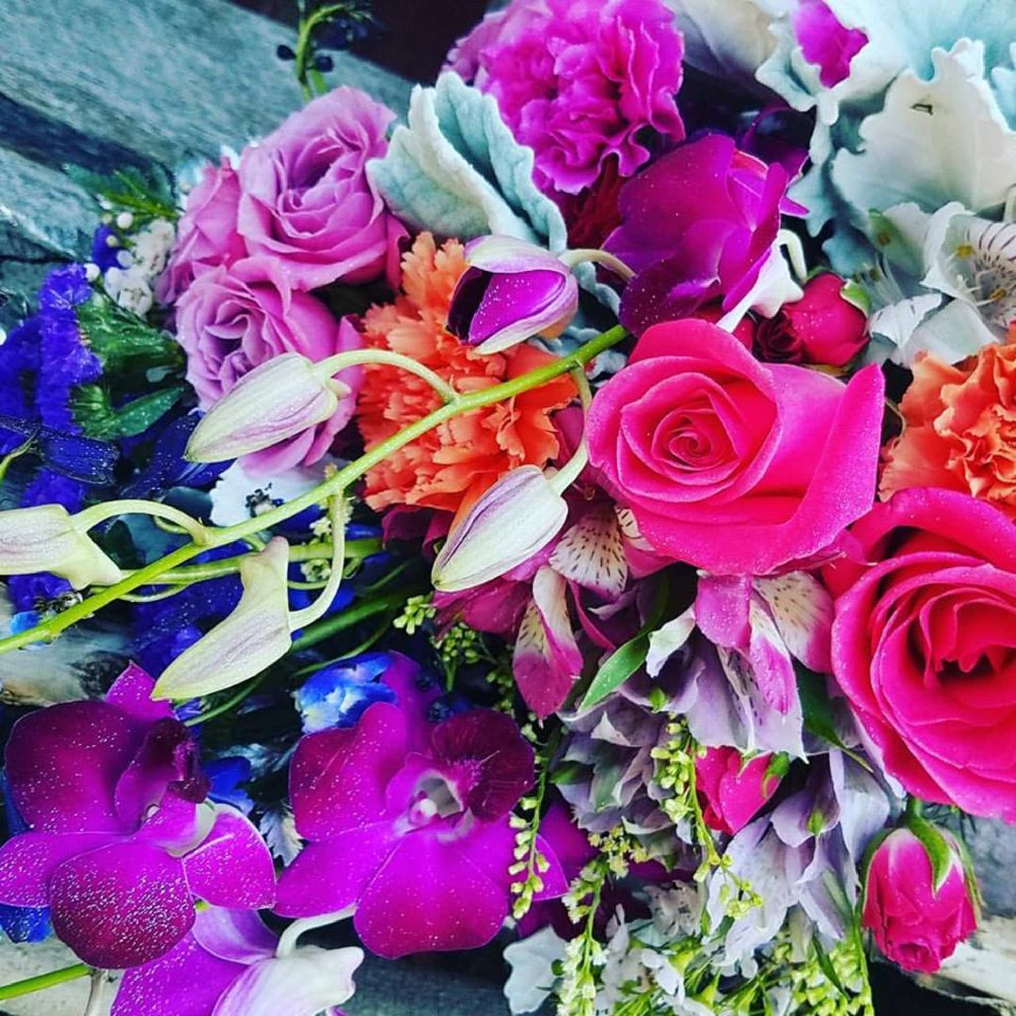 We will arrange your flowers beautifully wrapped in our brown craft paper We will arrange your flowers beautifully wrapped in our brown craft paper