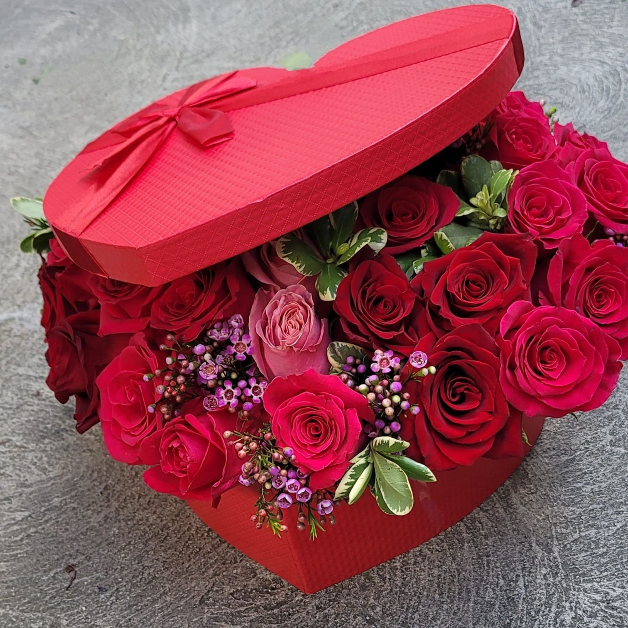 Beautiful Heart Shape Boxes stuffed with roses and greenery. 
Standard prices are