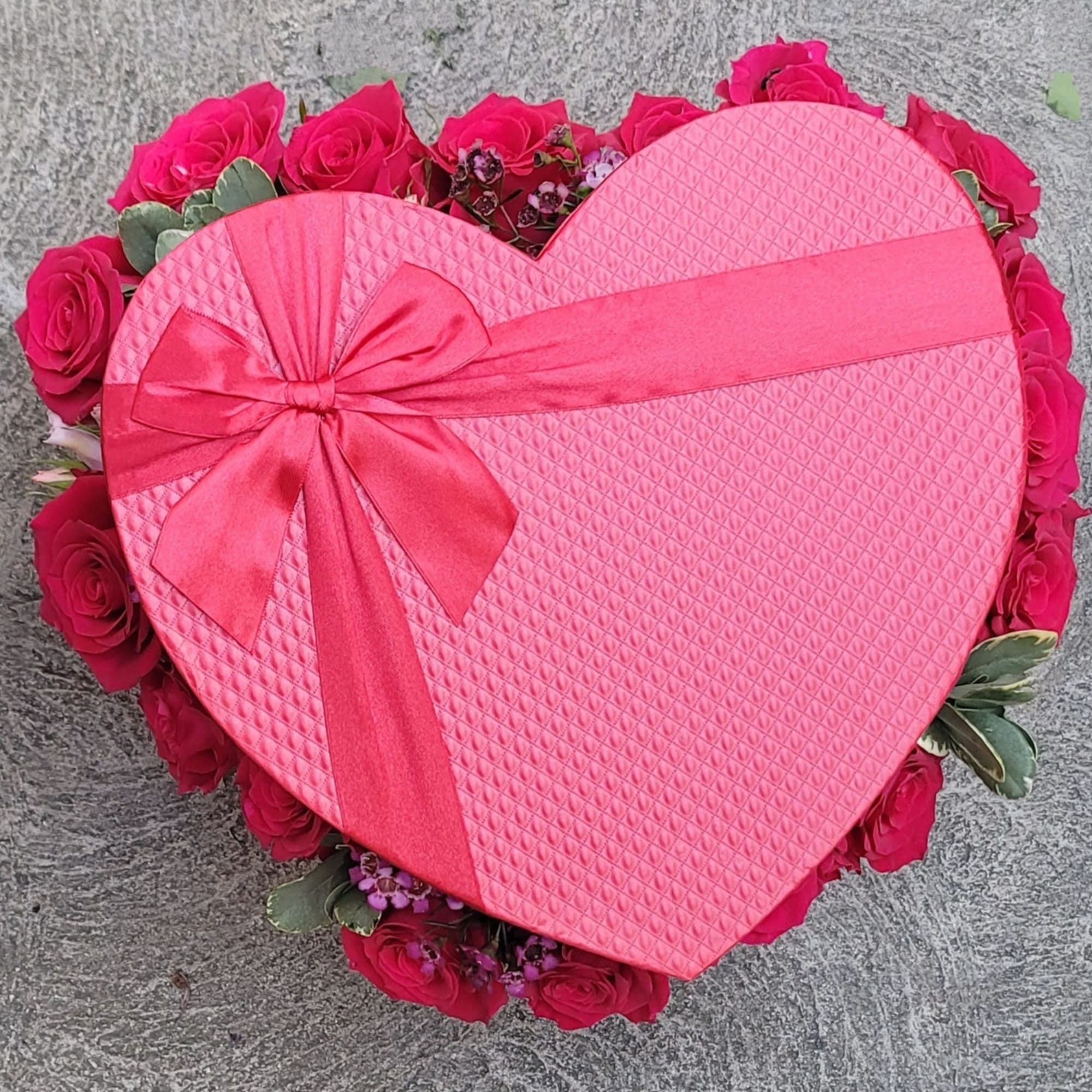 Beautiful Heart Shape Boxes stuffed with roses and greenery. 
Standard prices are
