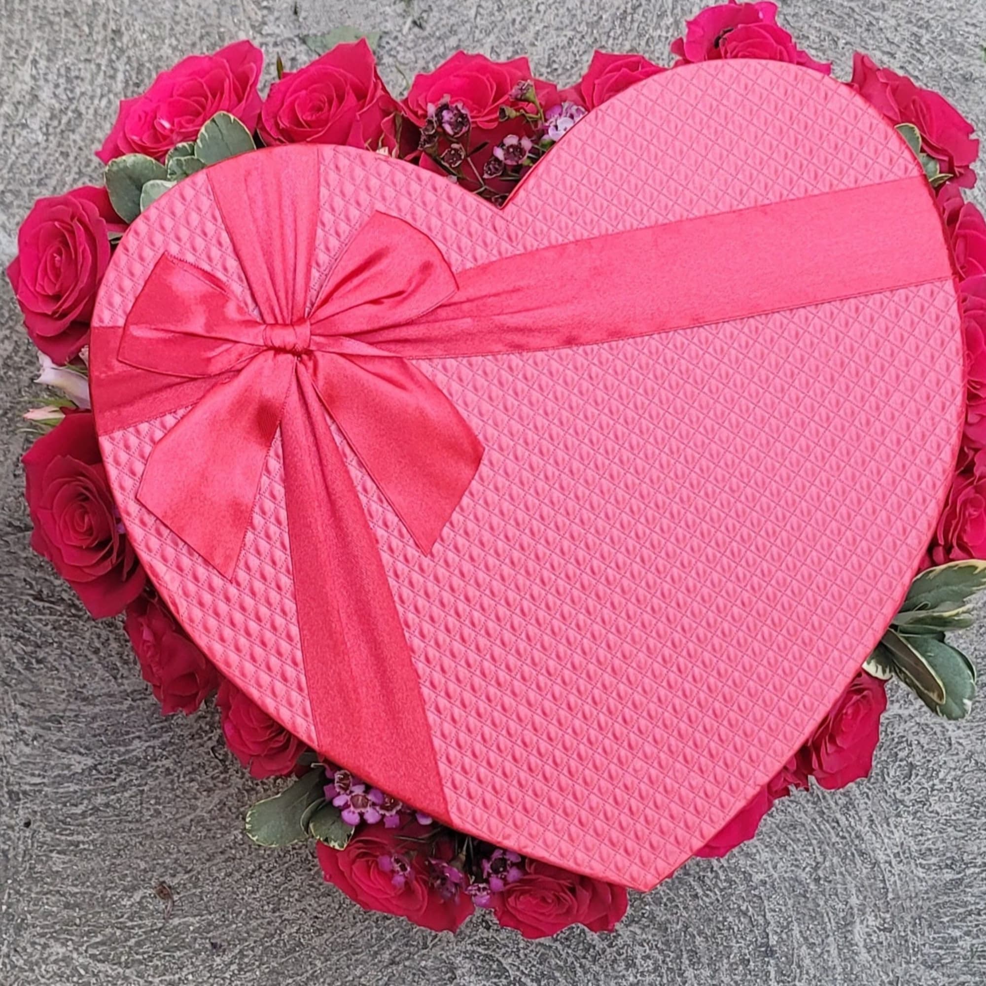 Beautiful Heart Shape Boxes stuffed with roses and greenery. 
Standard prices are