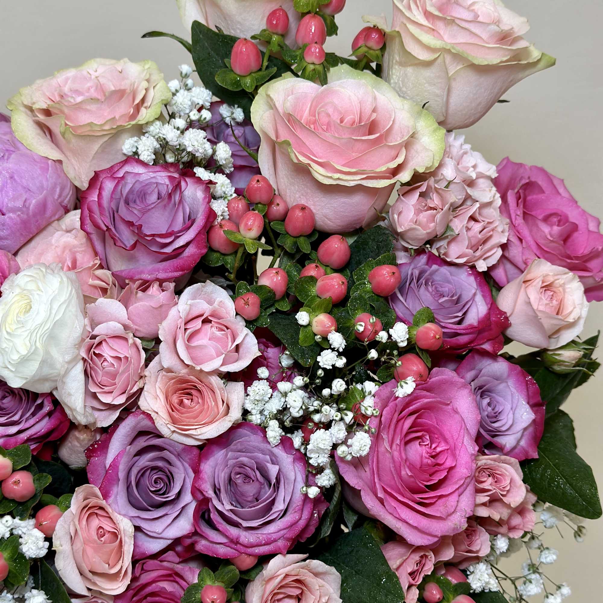 This gorgeous vase arrangement is filled with a mix of pink and