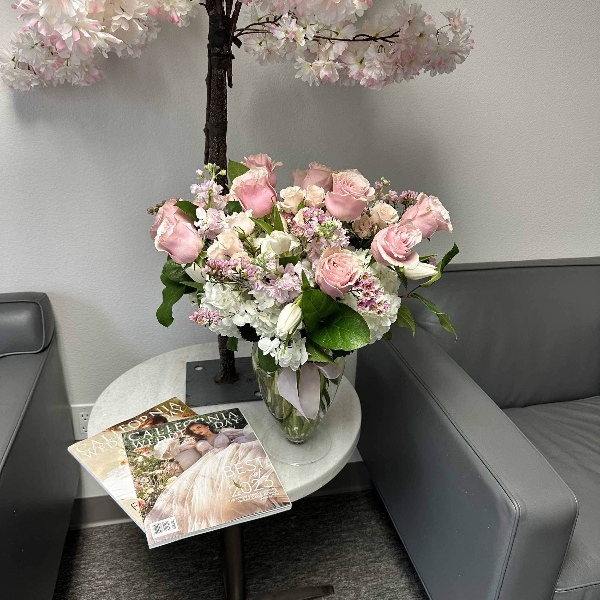 White and pink tall arrangement in a vase