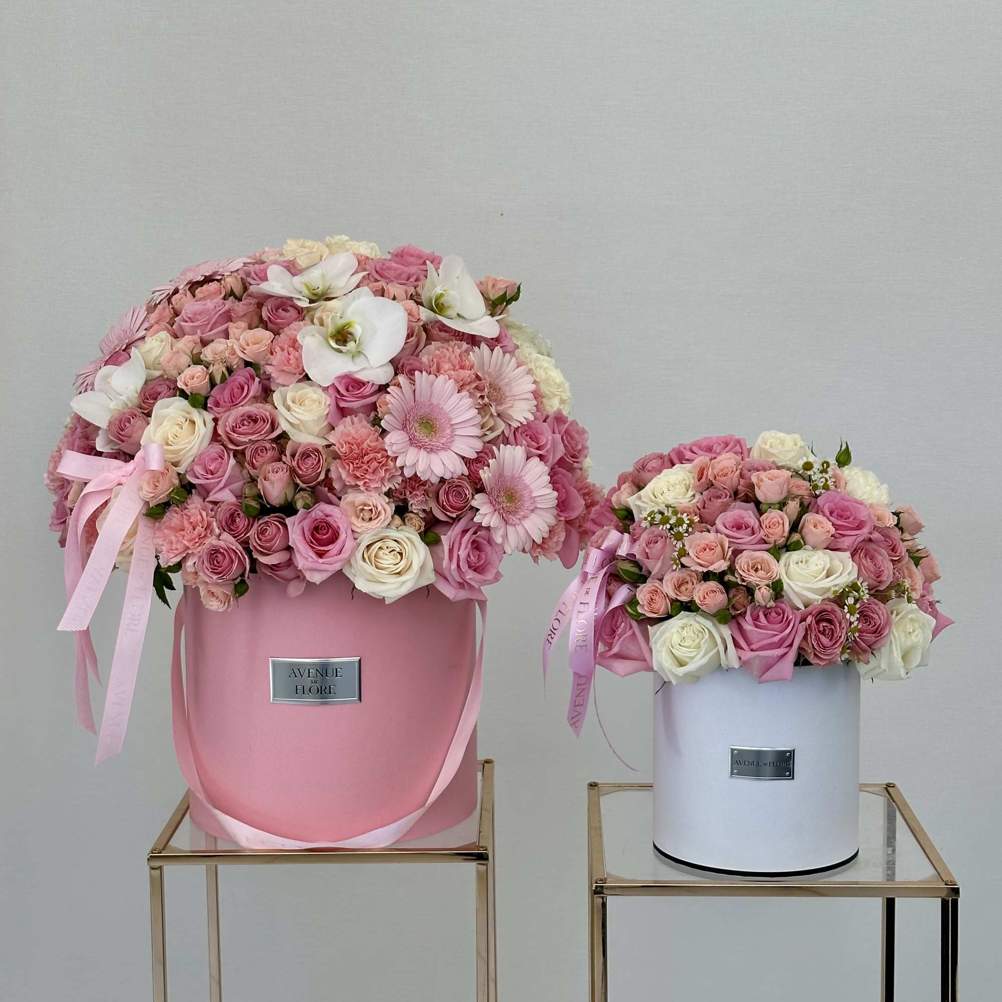 Unveil a touch of elegance with this pink box of beautiful flowers.