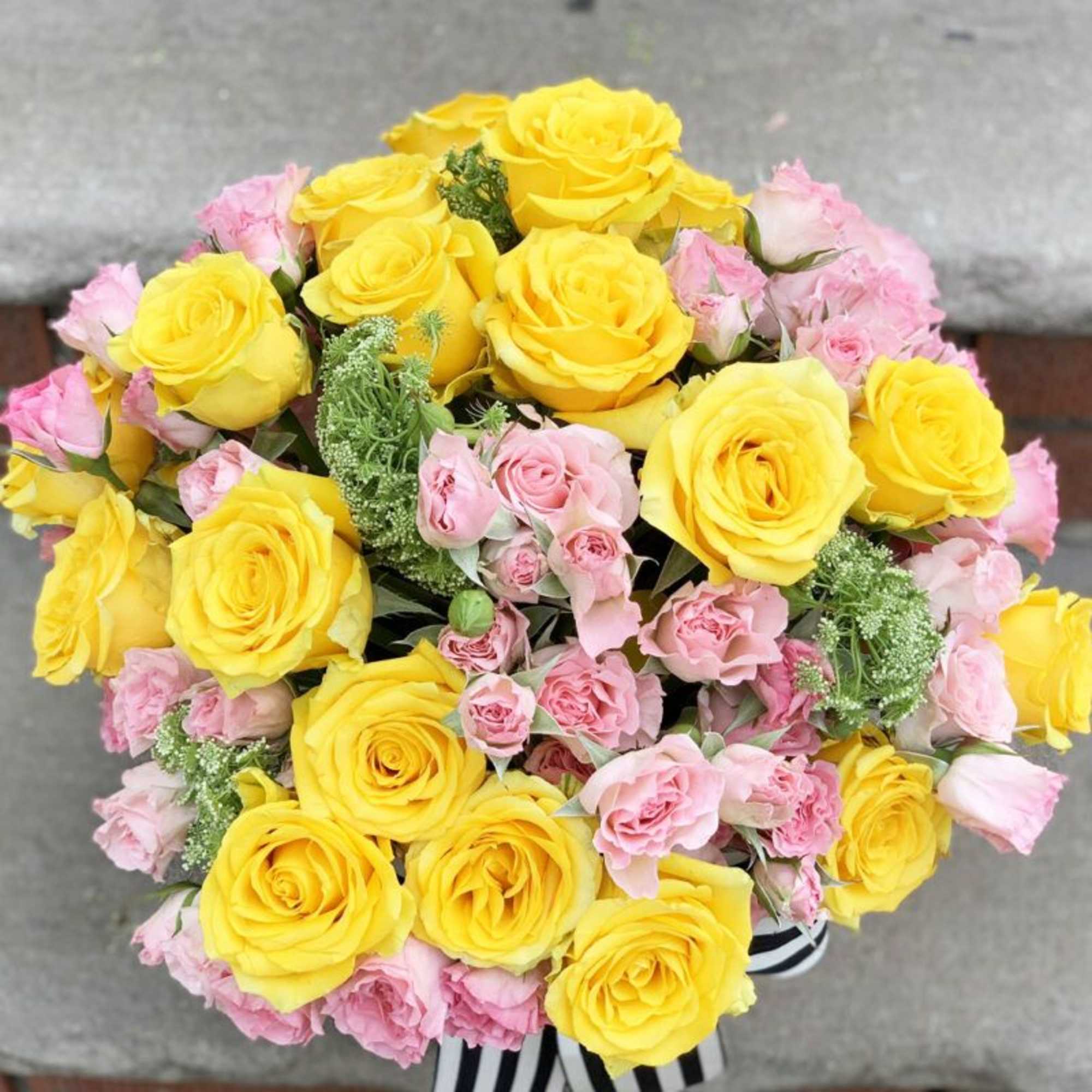 Yellow roses represents friendship , joy, and affection.  Pink roses symbolizes