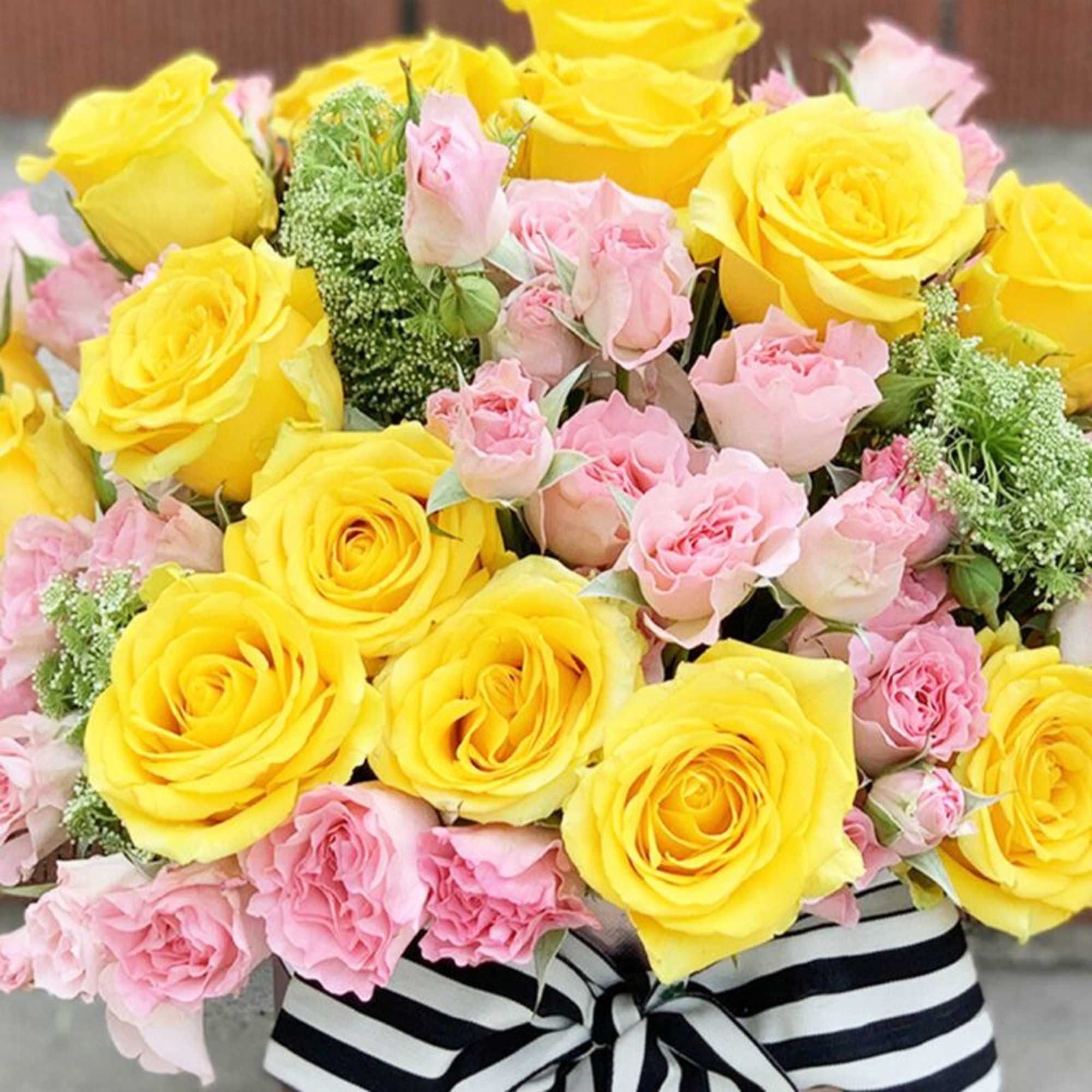 Yellow roses represents friendship , joy, and affection.  Pink roses symbolizes