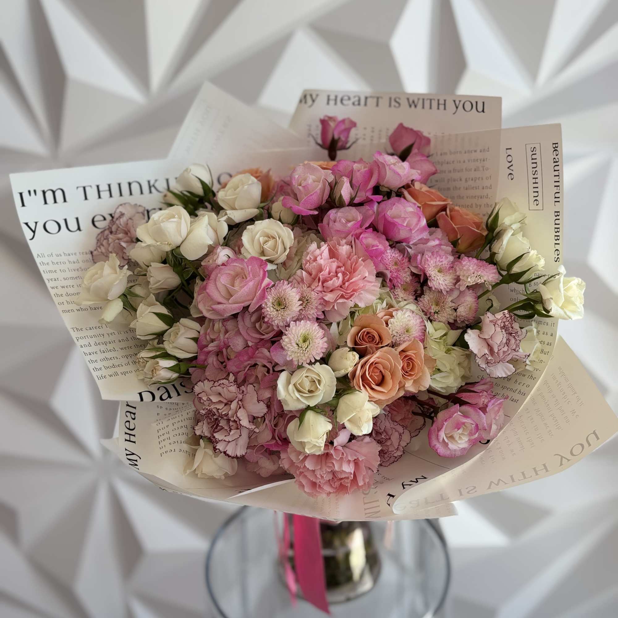 A delicate and sophisticated bouquet with the mix flowers , creating a
