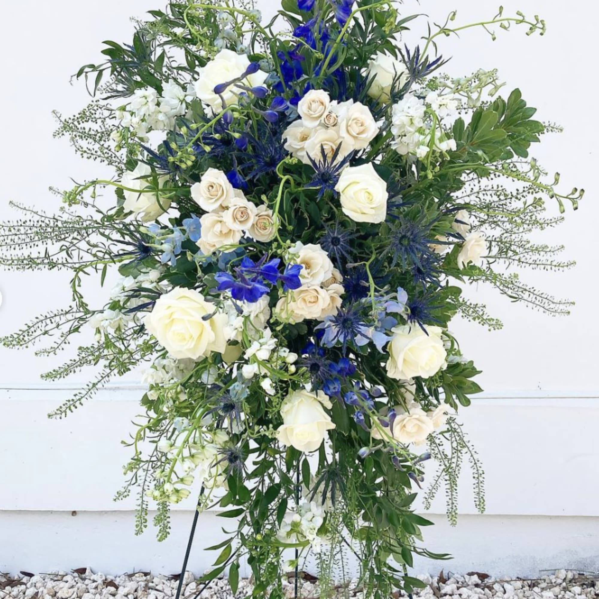 This oblong hanging floral spray adds a touch of elegance to celebrations