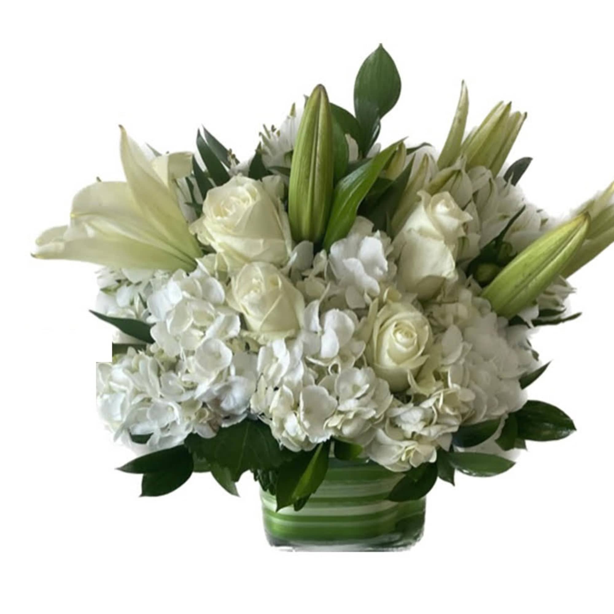 Arrangement of white Roses, Hydrangeas, Lilies and other flowers. Arranged in a Arrangement of white Roses, Hydrangeas, Lilies and other flowers. Arranged in a