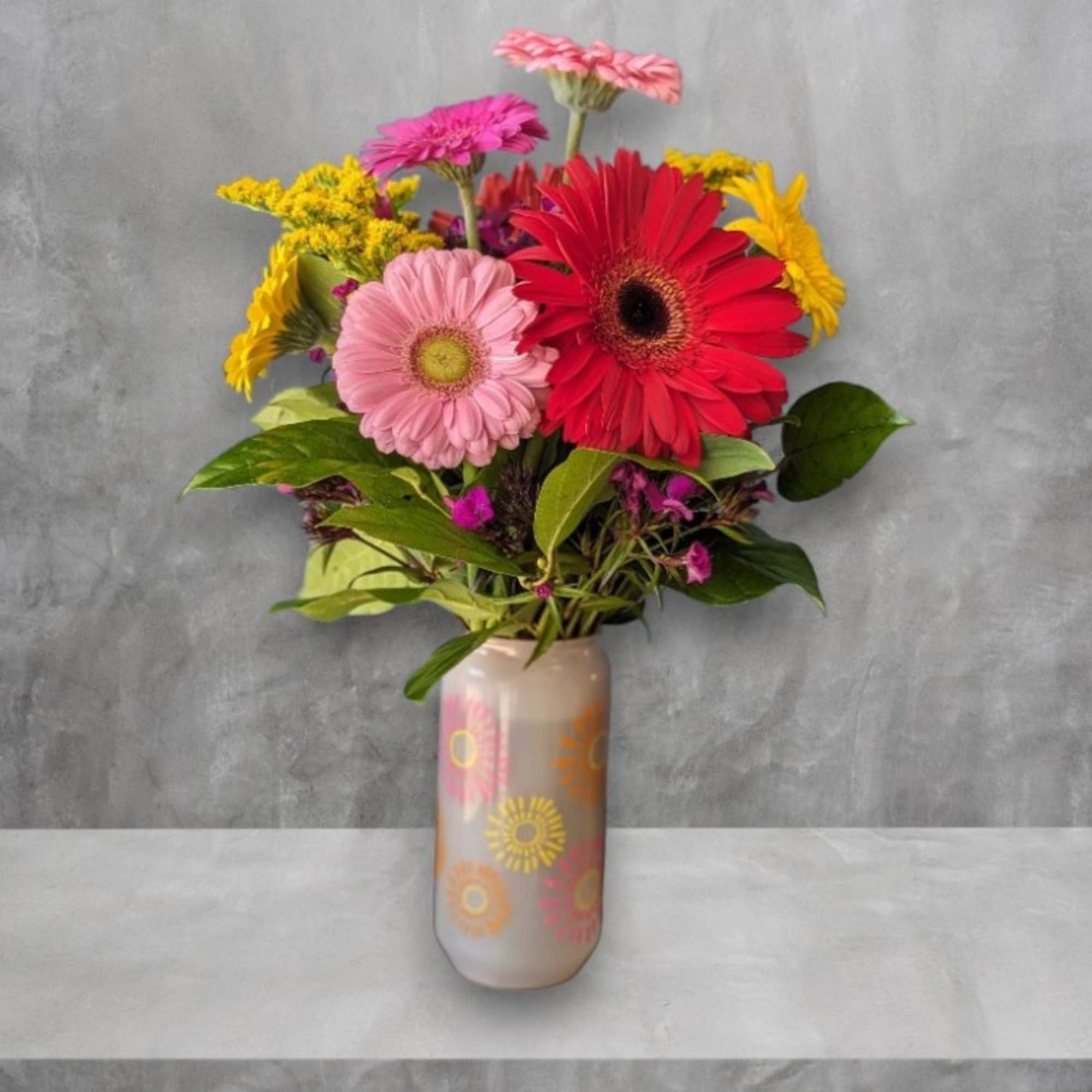 Introducing "Darling Daisies": A charming floral arrangement featuring six vibrant gerbera daisies Introducing "Darling Daisies": A charming floral arrangement featuring six vibrant gerbera daisies