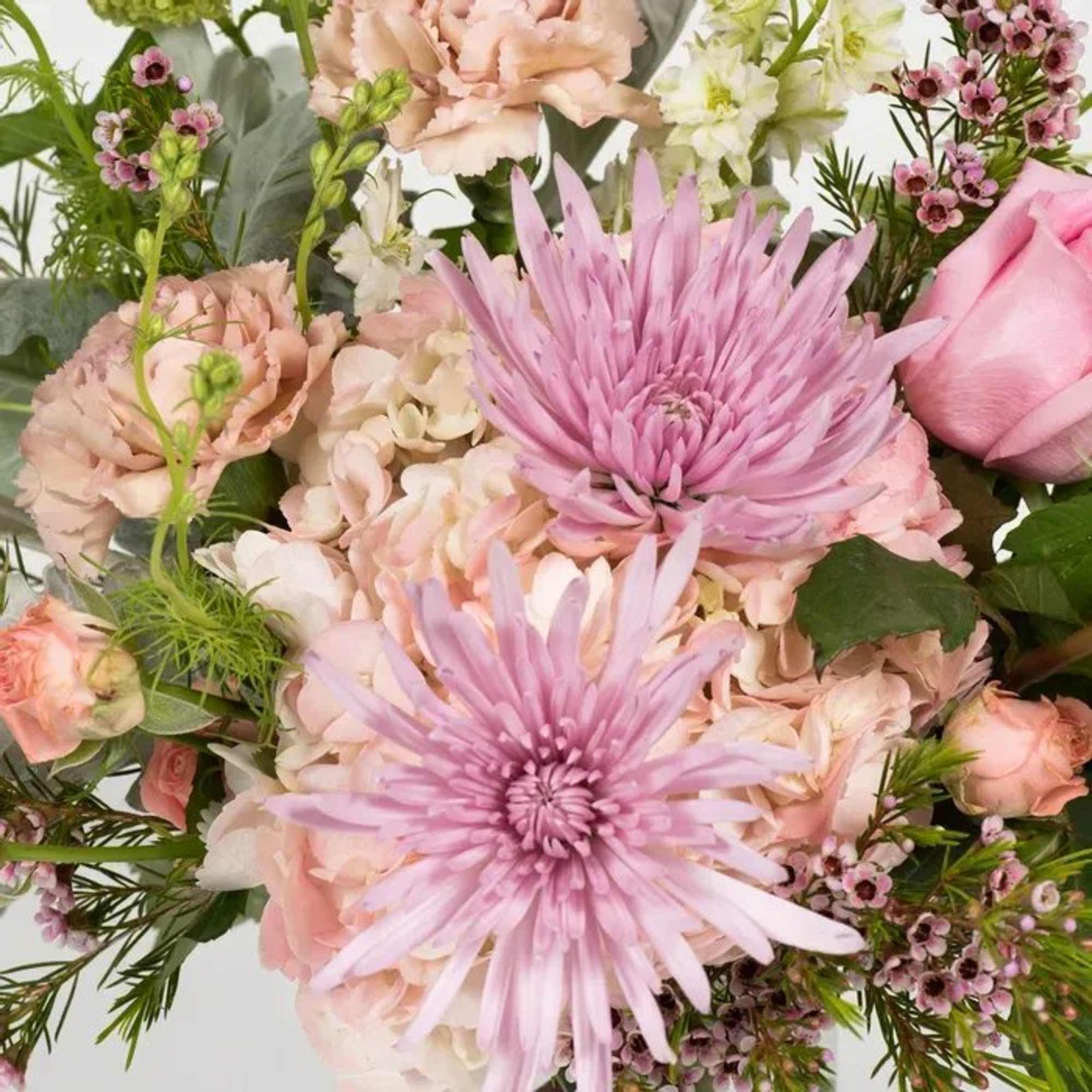 Show your appreciation with this arrangement straight out of a classic English