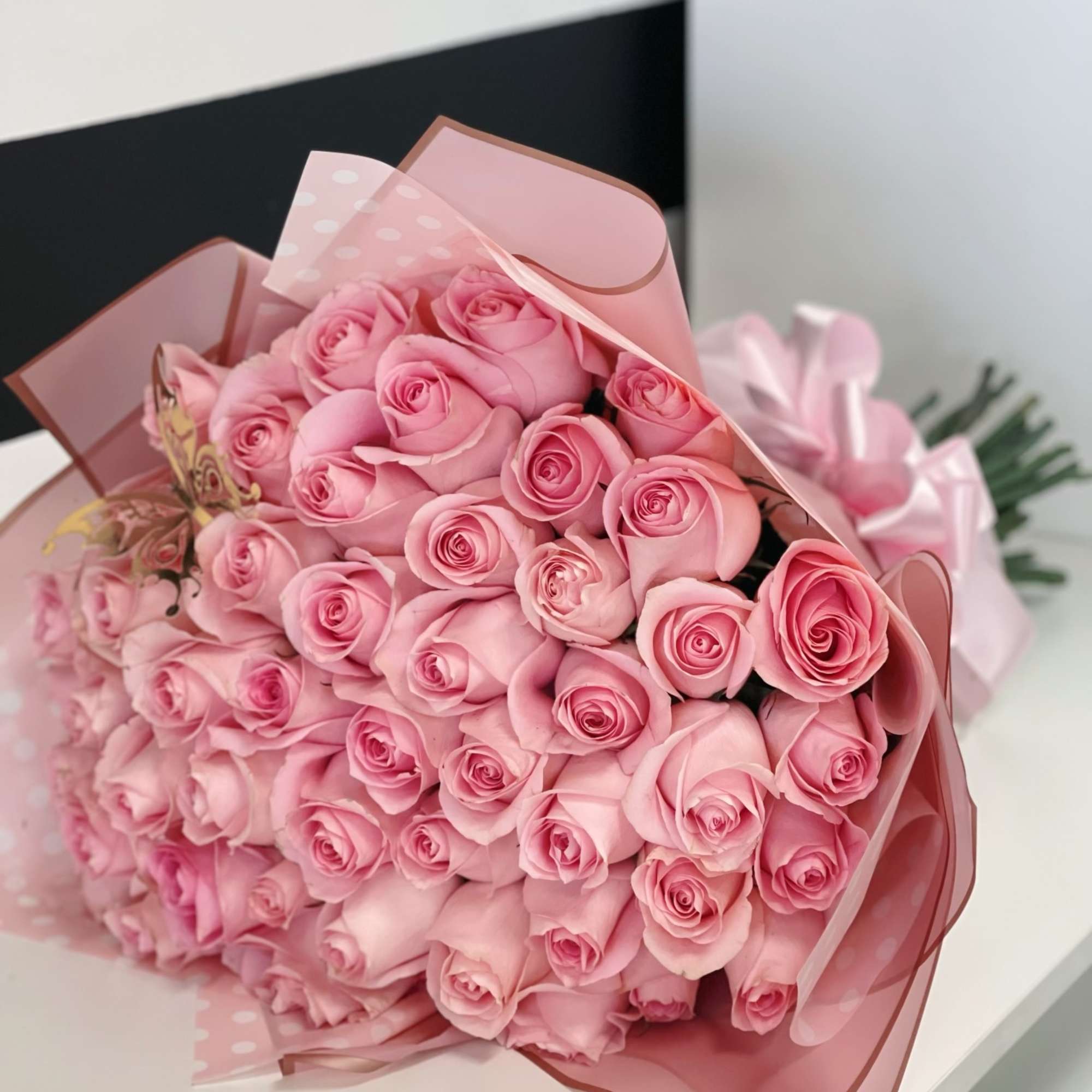 Pink Long stem Roses Wrapped Bouquet  Pink Long stem Roses Wrapped Bouquet