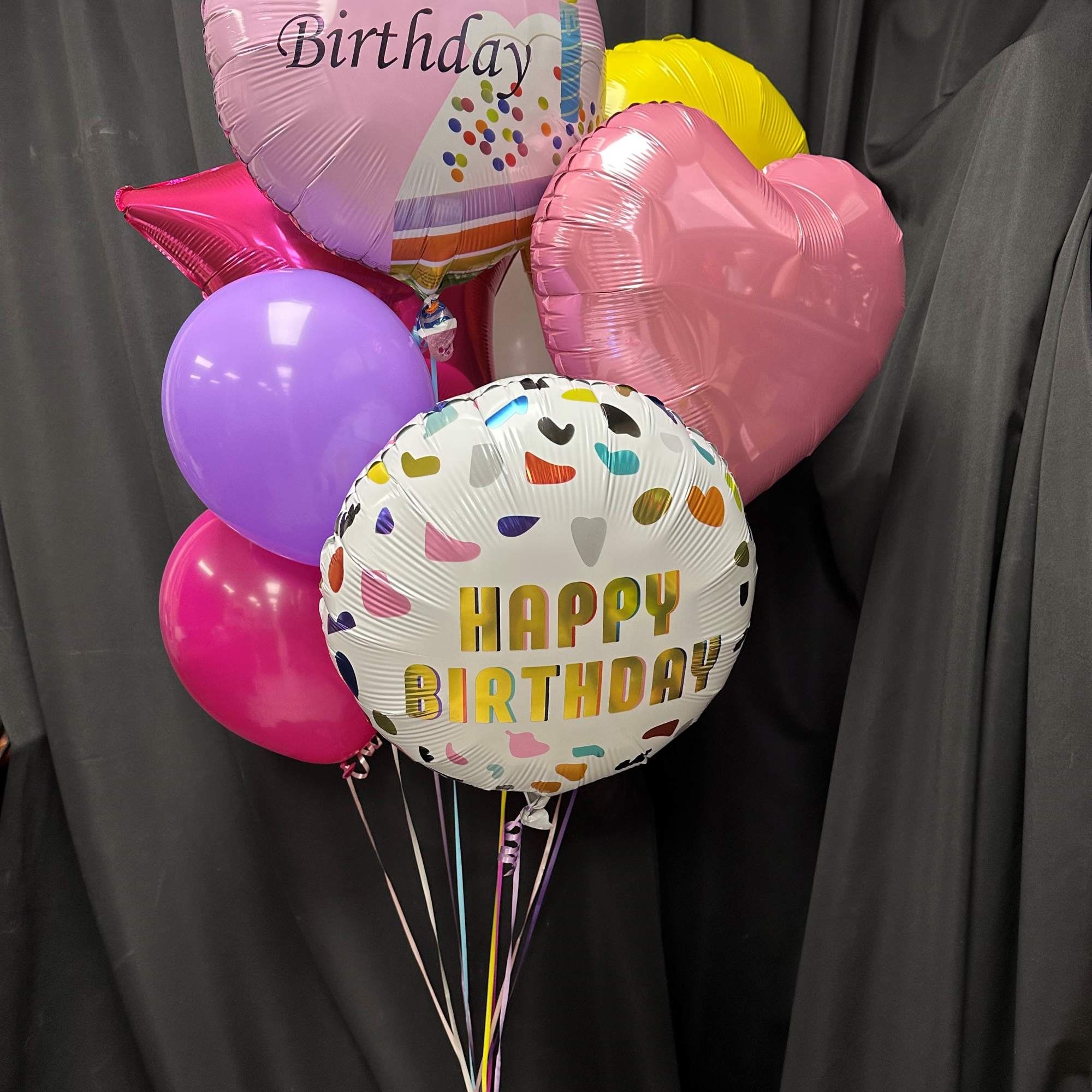 Celebrate their special day in style with our vibrant Birthday Balloon Bouquet