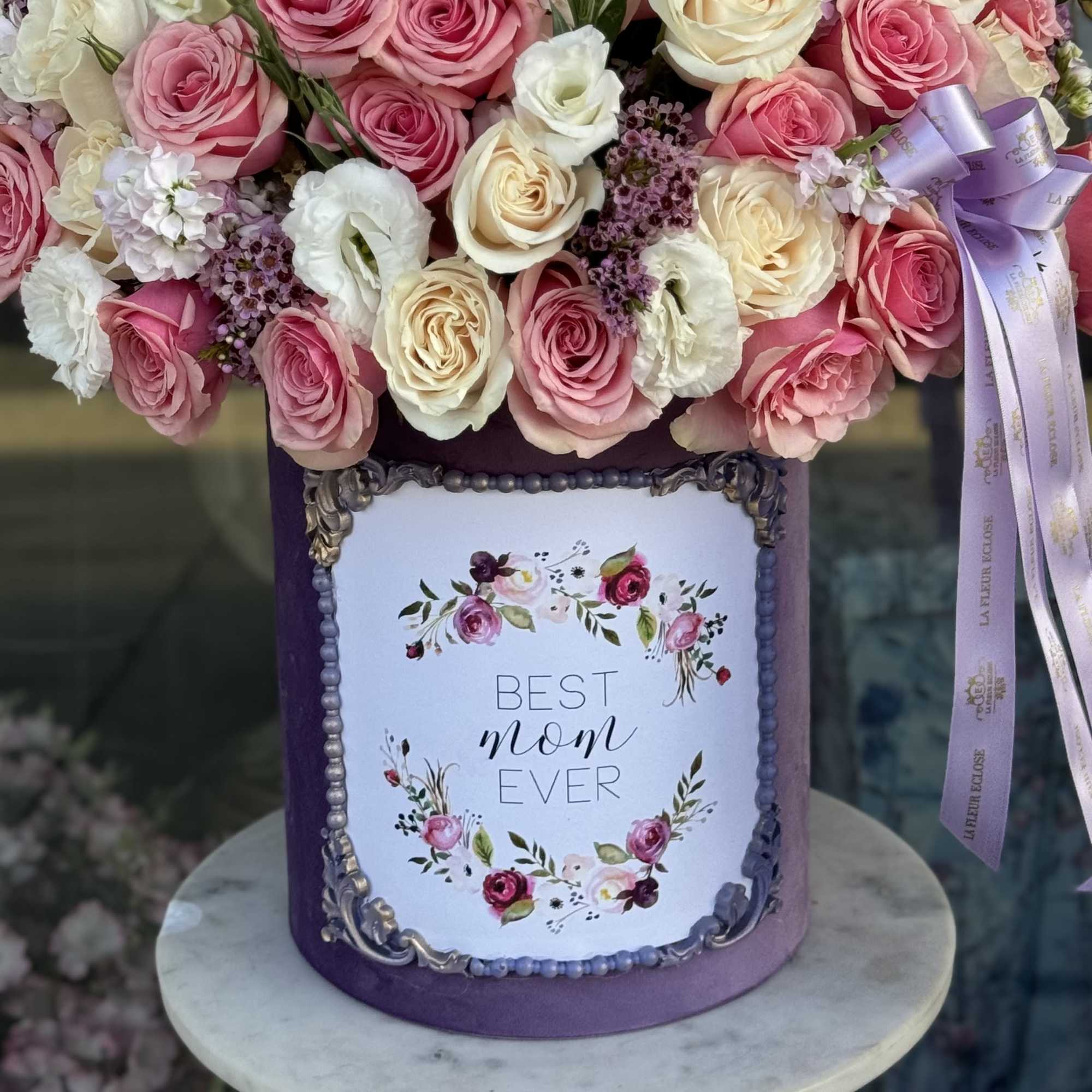 A breathtaking mix of blush pink, ivory, and soft lilac roses, delicately A breathtaking mix of blush pink, ivory, and soft lilac roses, delicately