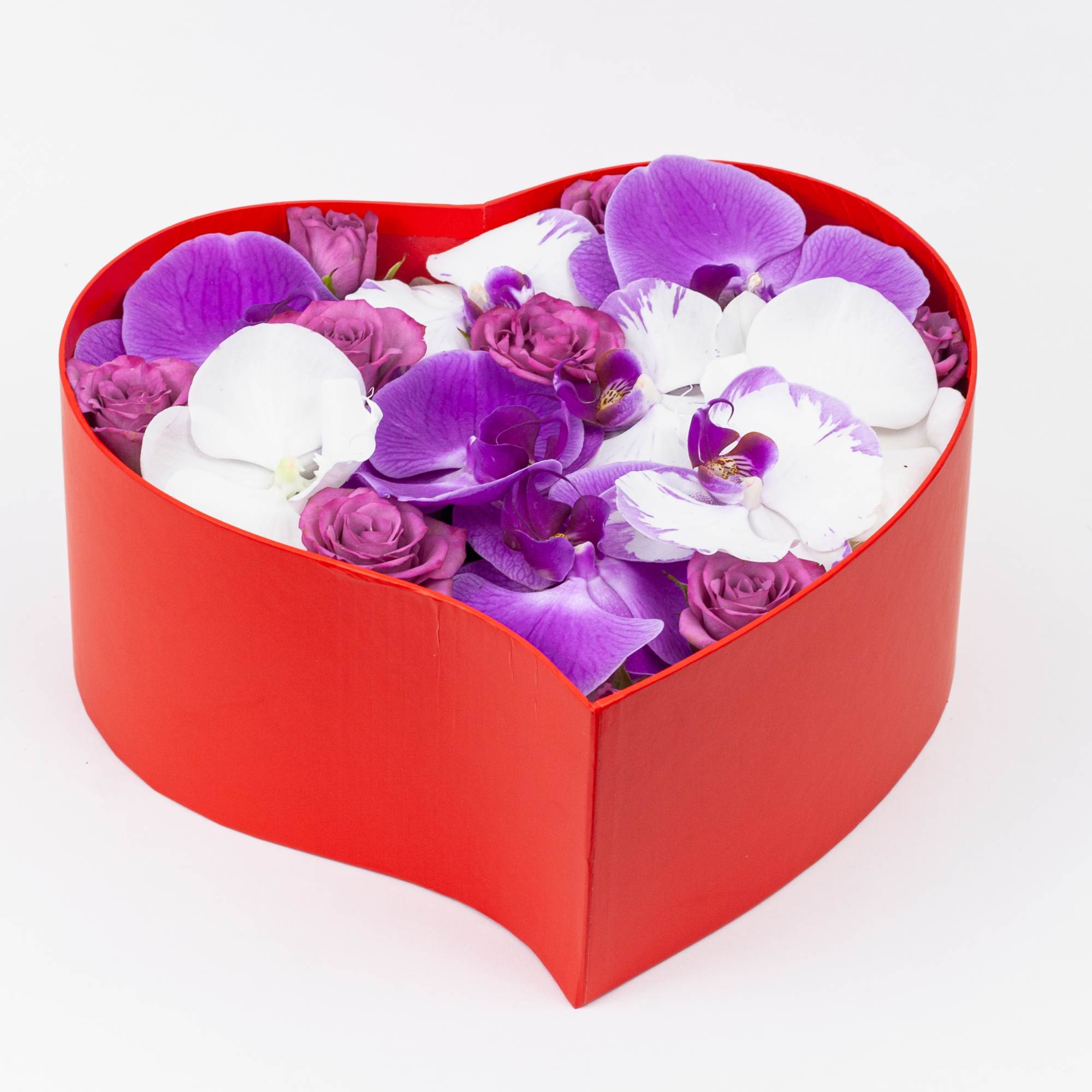 Heart Box made of spray roses, hydrangea, and blossoms of phalaenopsis orchids.