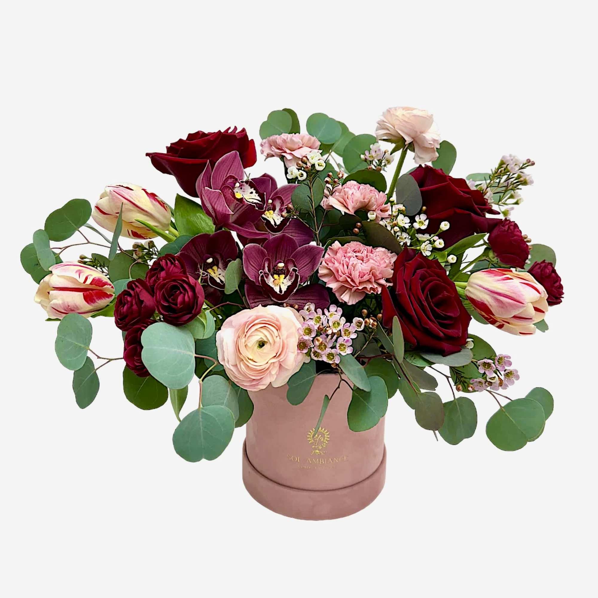 Pure Romance - elegant arrangement in a vase of delicate shades. 
PASSIONATE