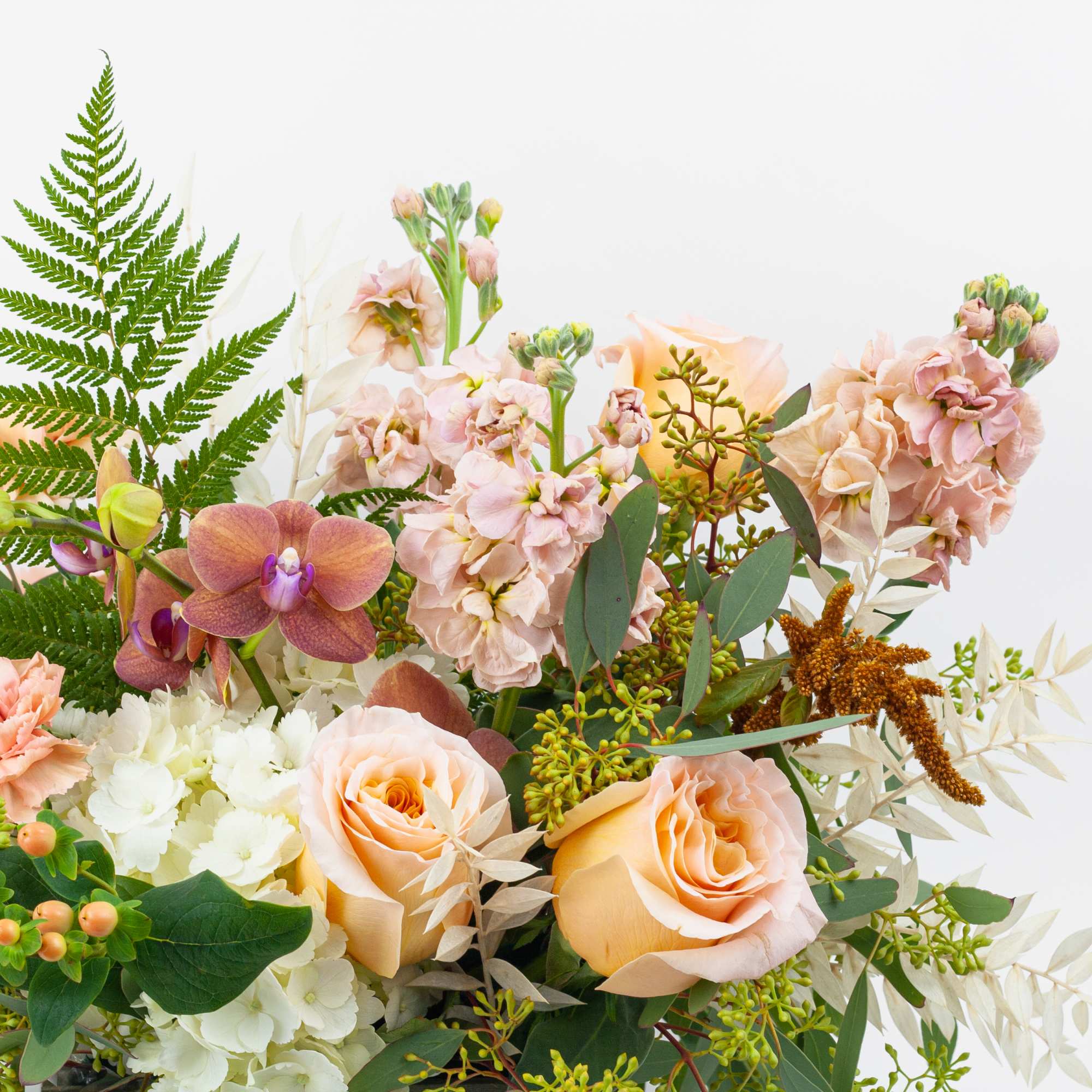 Peach Surprise design is made of all white and peach flowers. Perfect