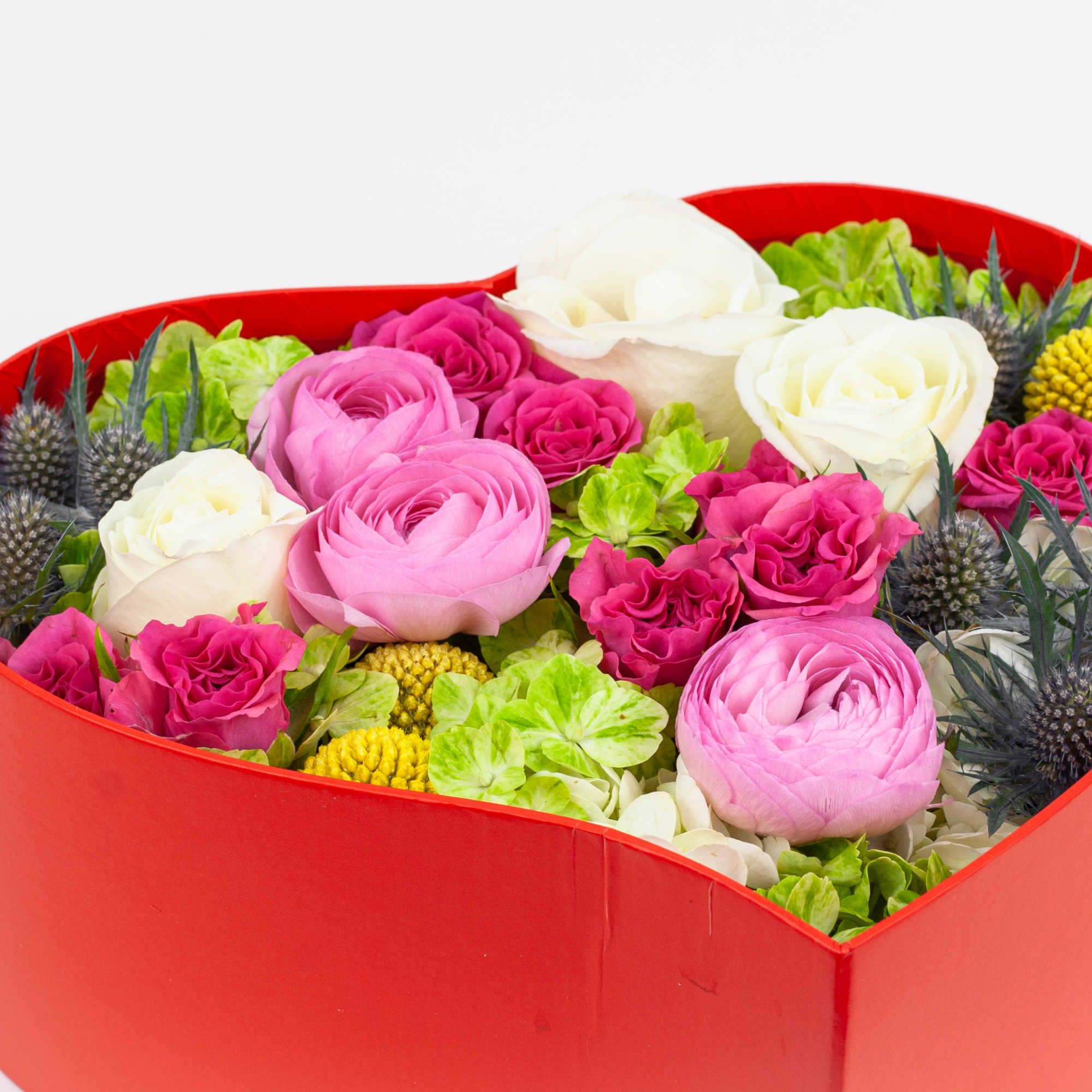 Show how much you care with a romantic collection of ranunculuses, roses