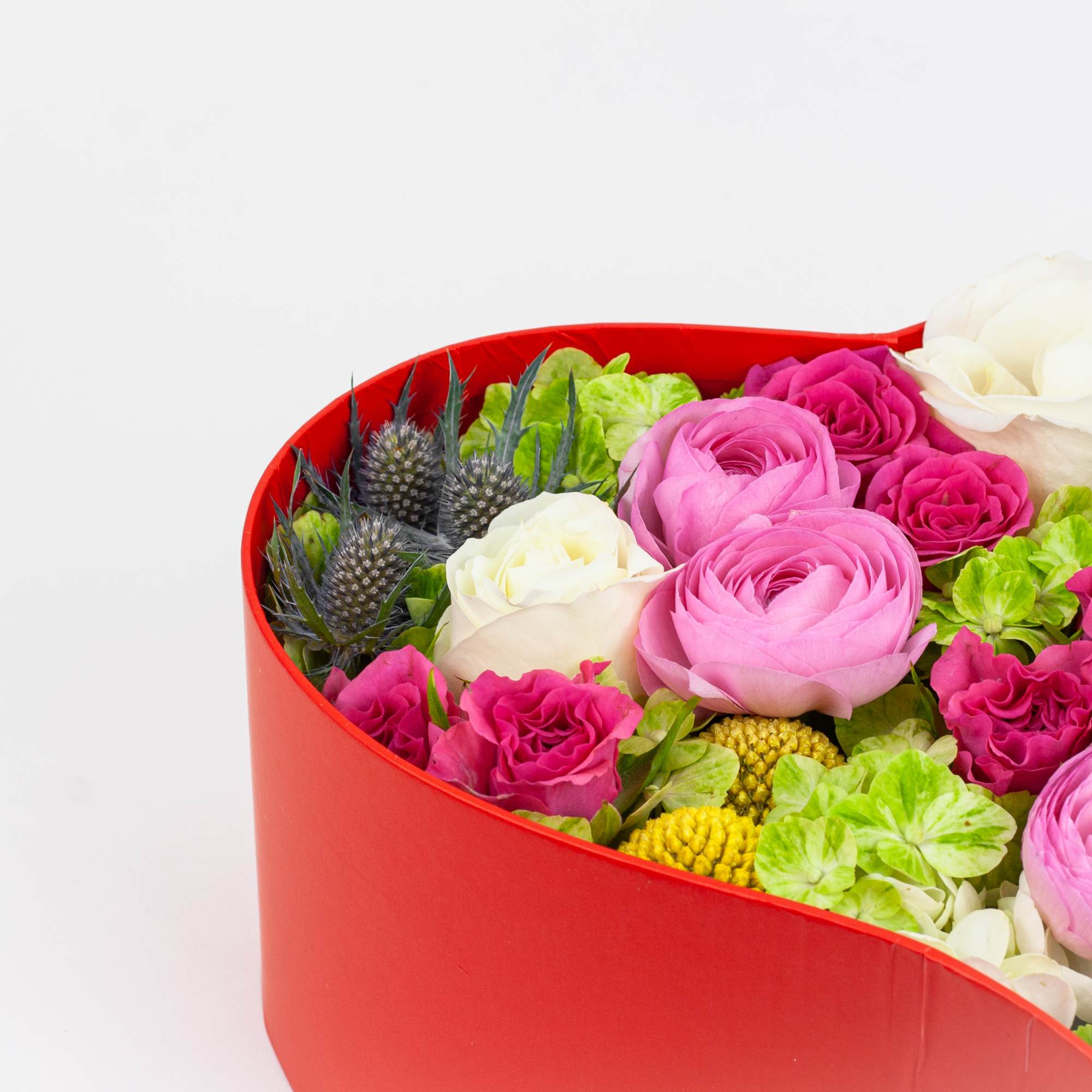 Show how much you care with a romantic collection of ranunculuses, roses