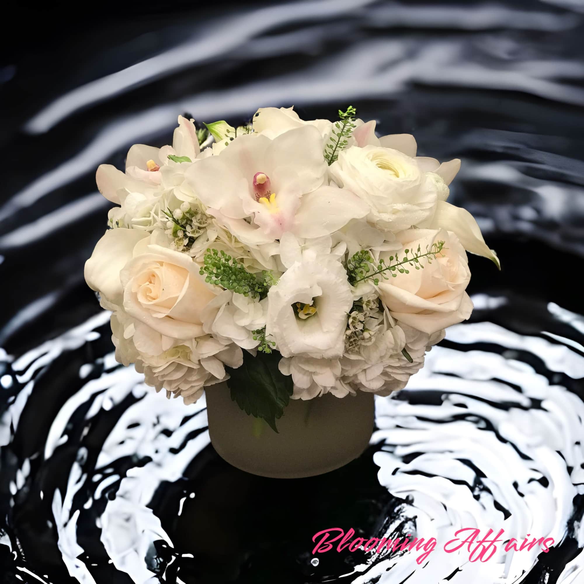All White arrangement in a vase