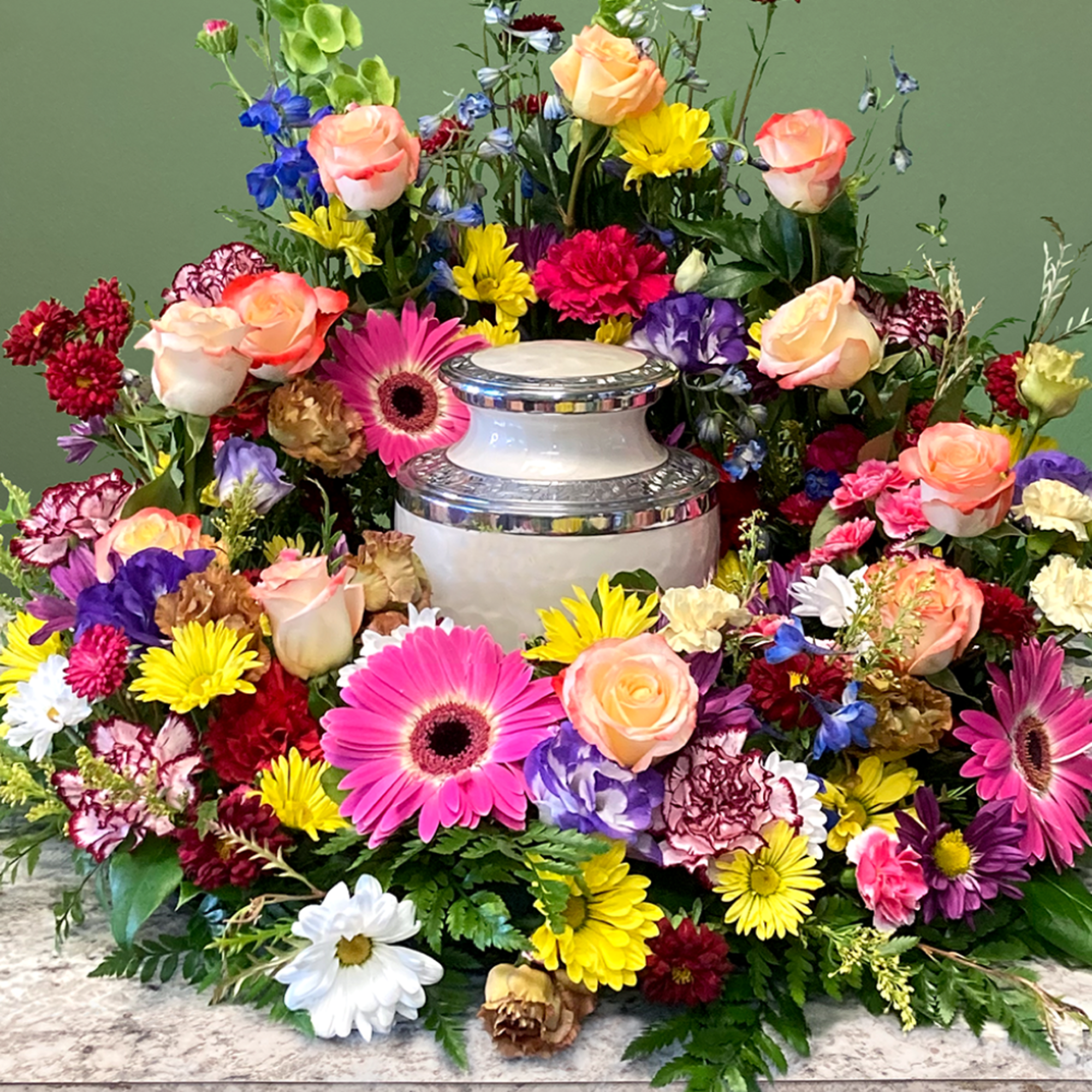 A vibrant urn wreath that honors cherished memories with grace, showcasing a