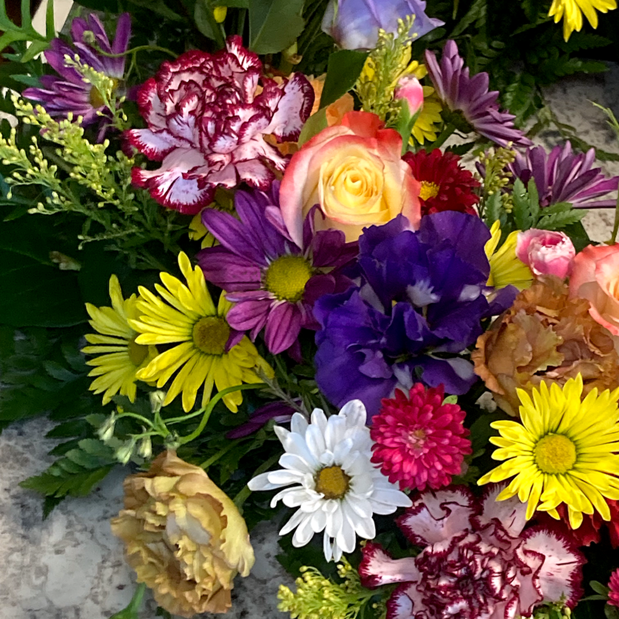 A vibrant urn wreath that honors cherished memories with grace, showcasing a