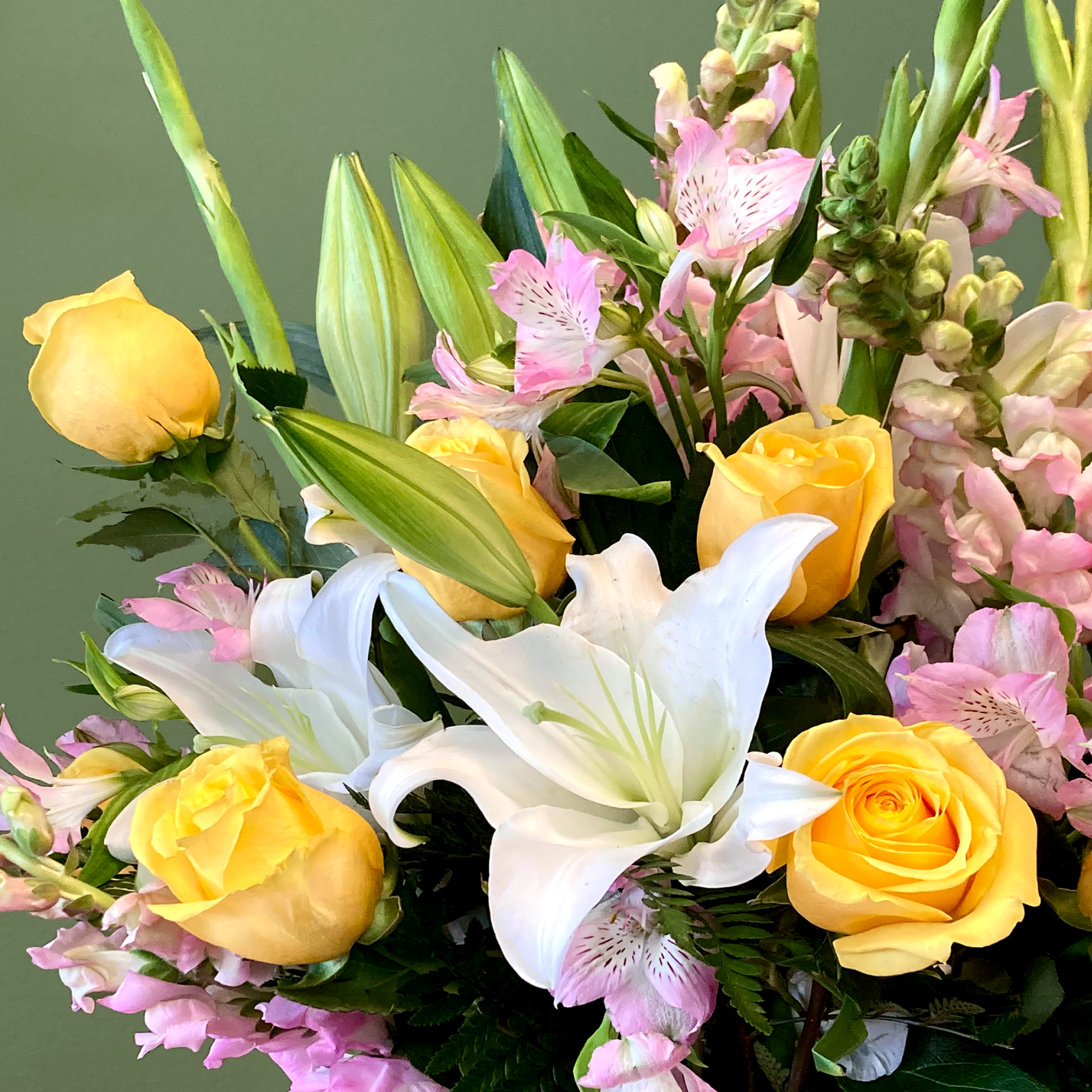 Sunshine is a radiant mixed arrangement that showcases a bright palette of