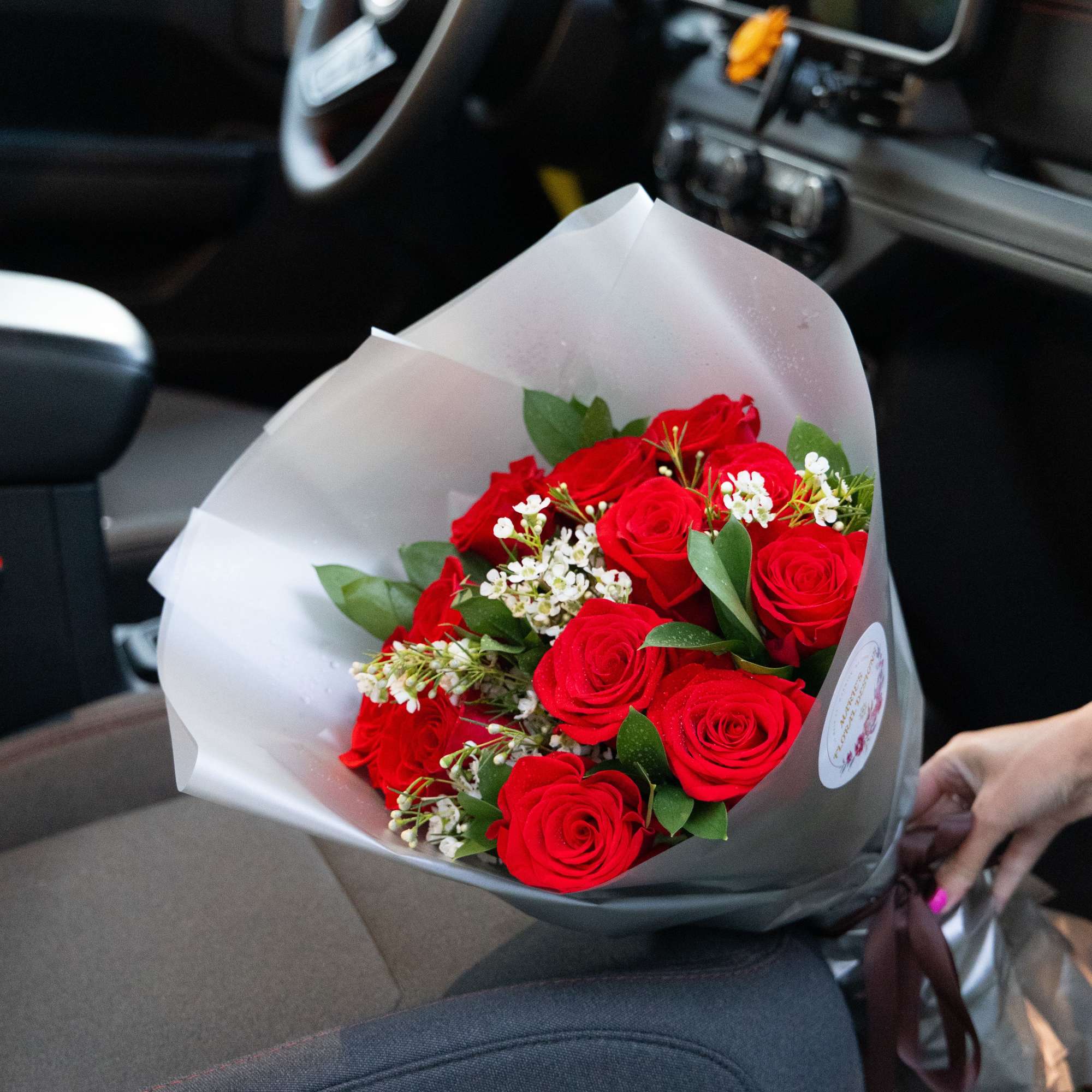 Dozen long stem red roses, as a bouquet 
