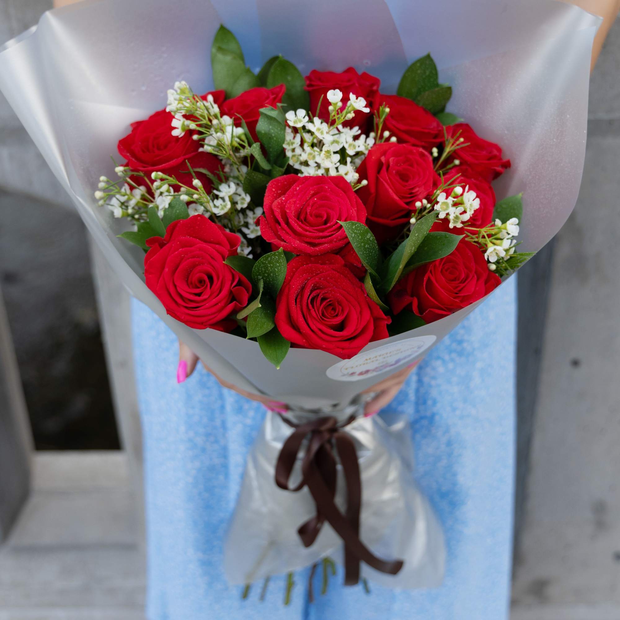 Dozen long stem red roses, as a bouquet 
