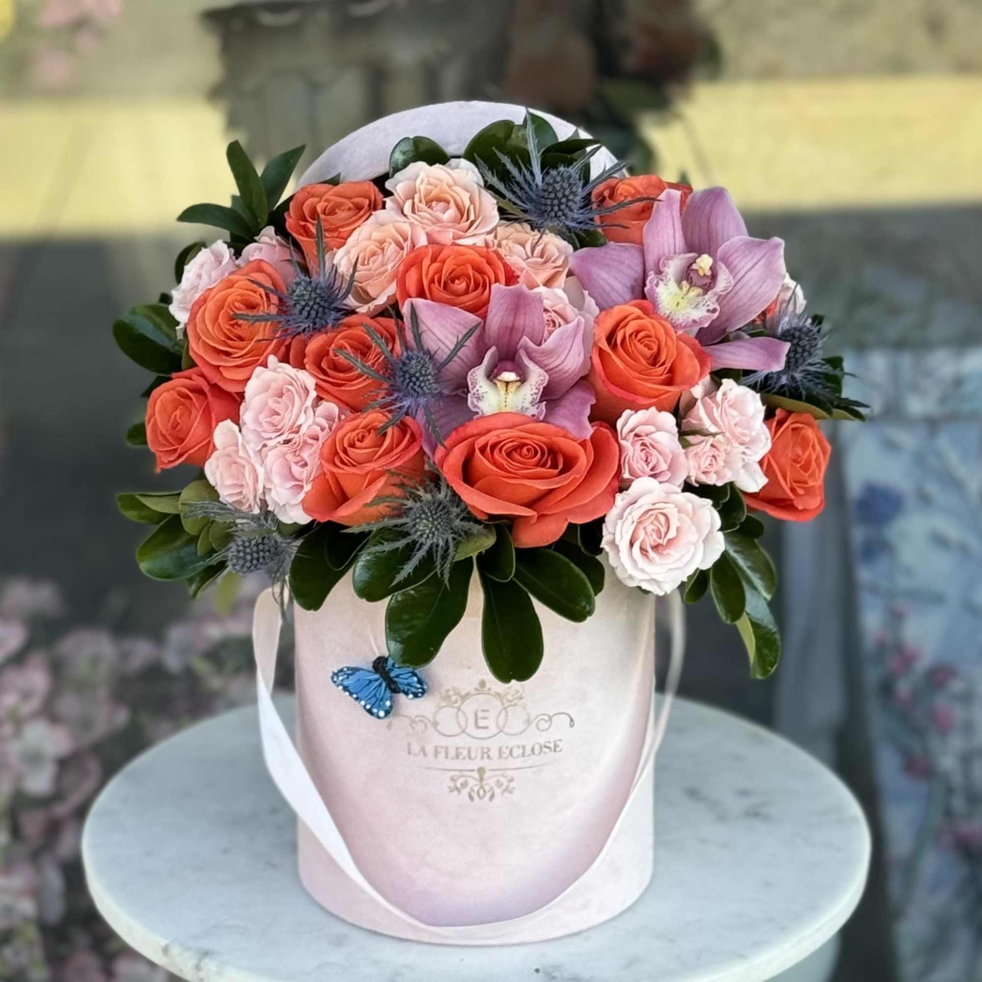 Brighten someone&rsquo;s day with our vibrant arrangement, bursting with bold colors and