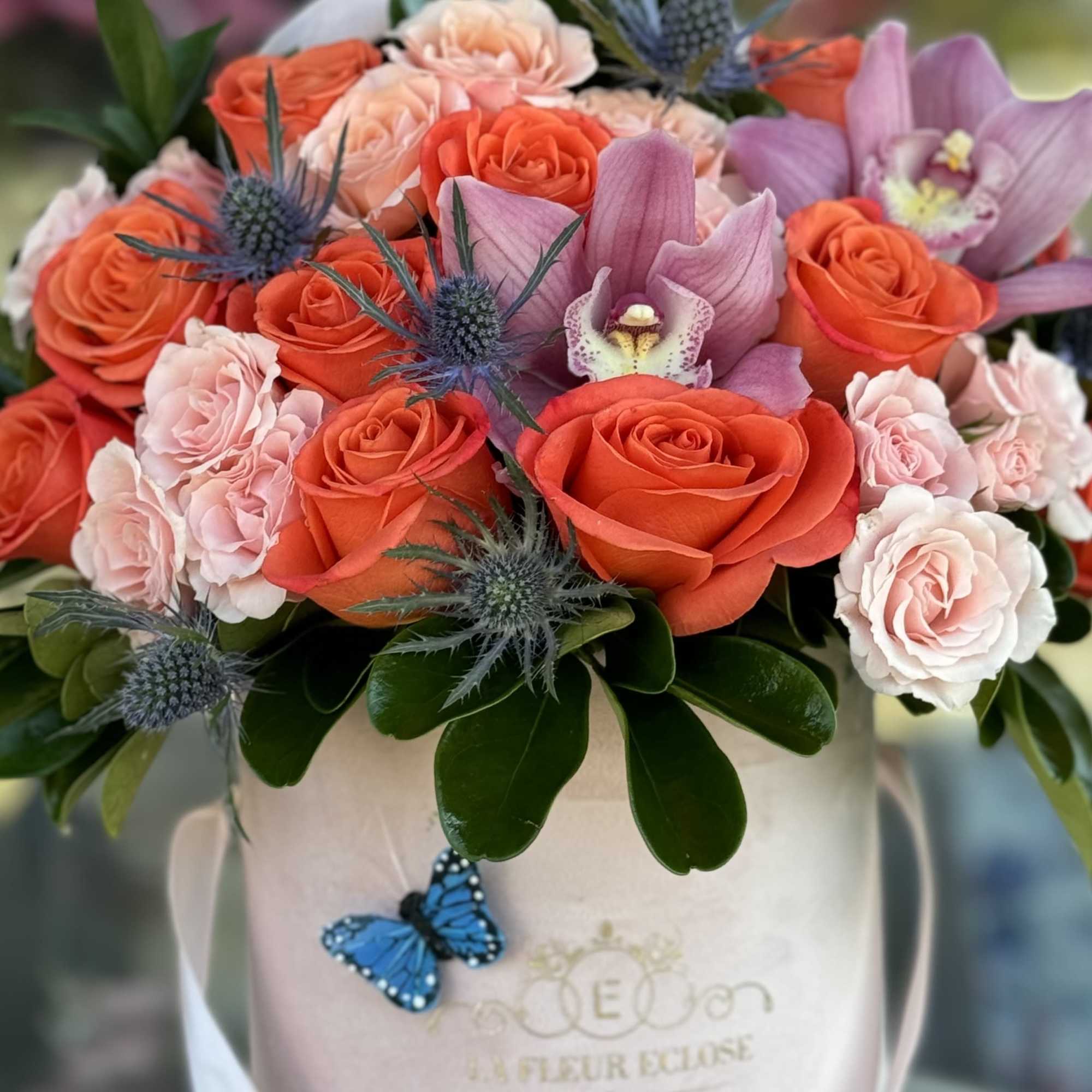 Brighten someone&rsquo;s day with our vibrant arrangement, bursting with bold colors and