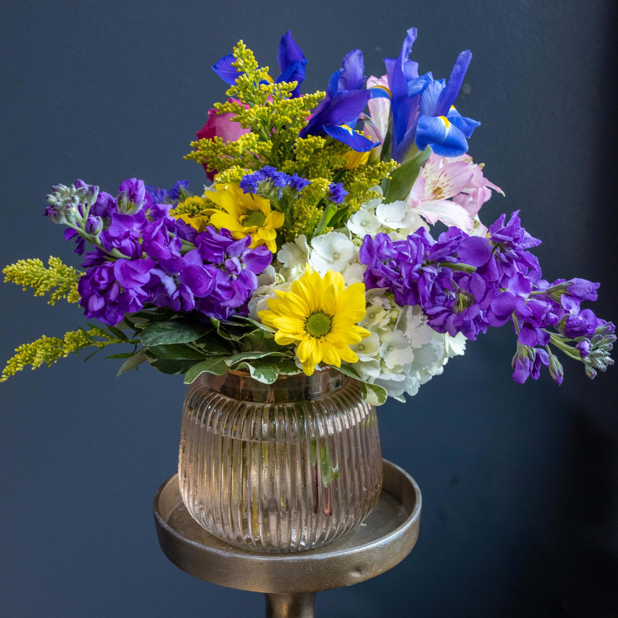 This vibrant arrangement full of life and color with flowing textures of