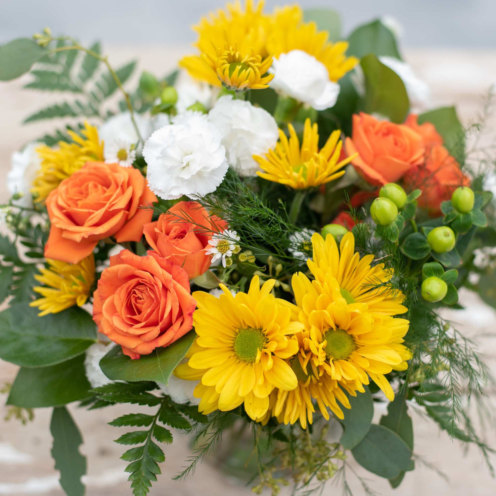This 3 1/2&quot; by 5&quot; ivy bowl is overflowing with orange spray