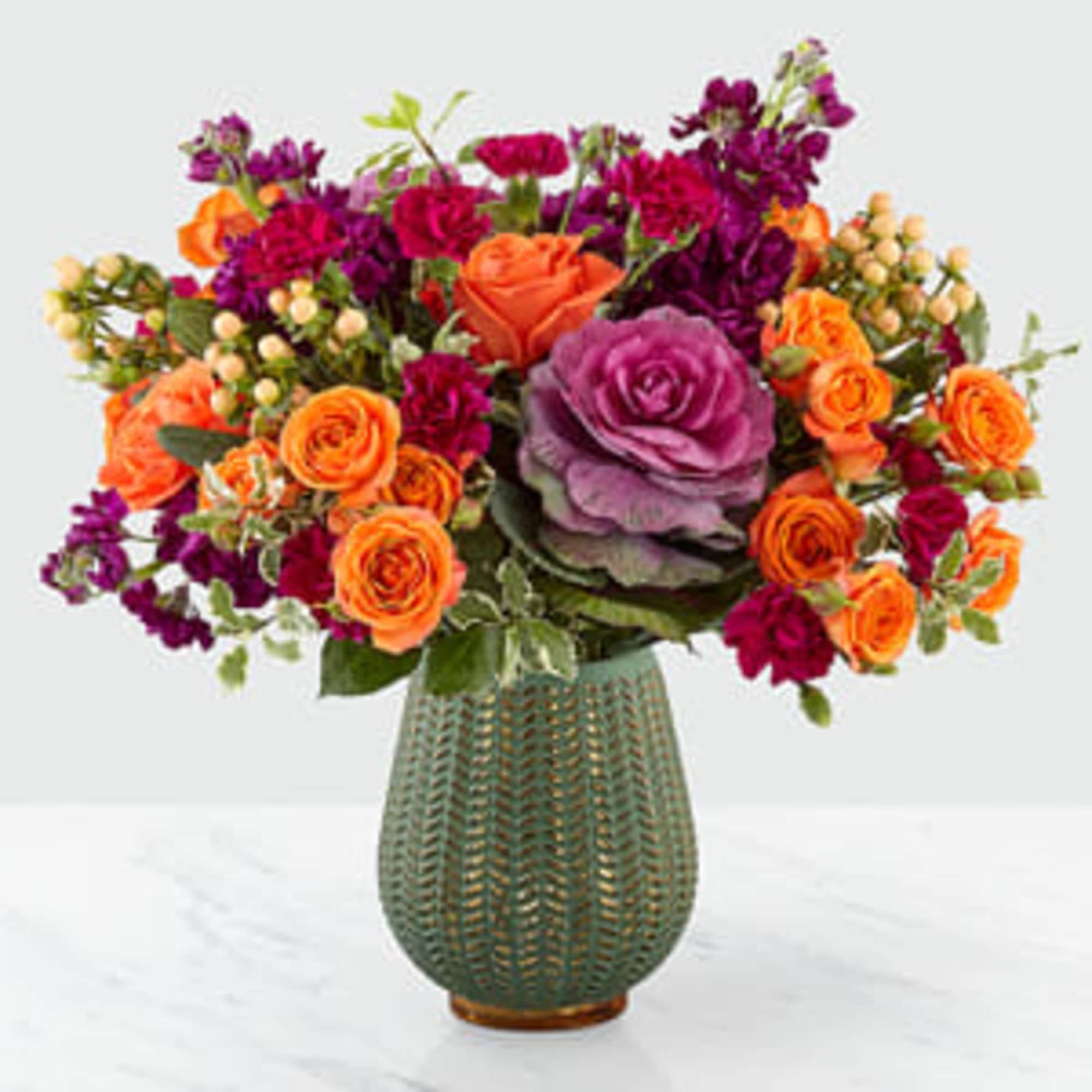 Celebrate the season with a fresh take on traditional harvest arrangements. Comprised