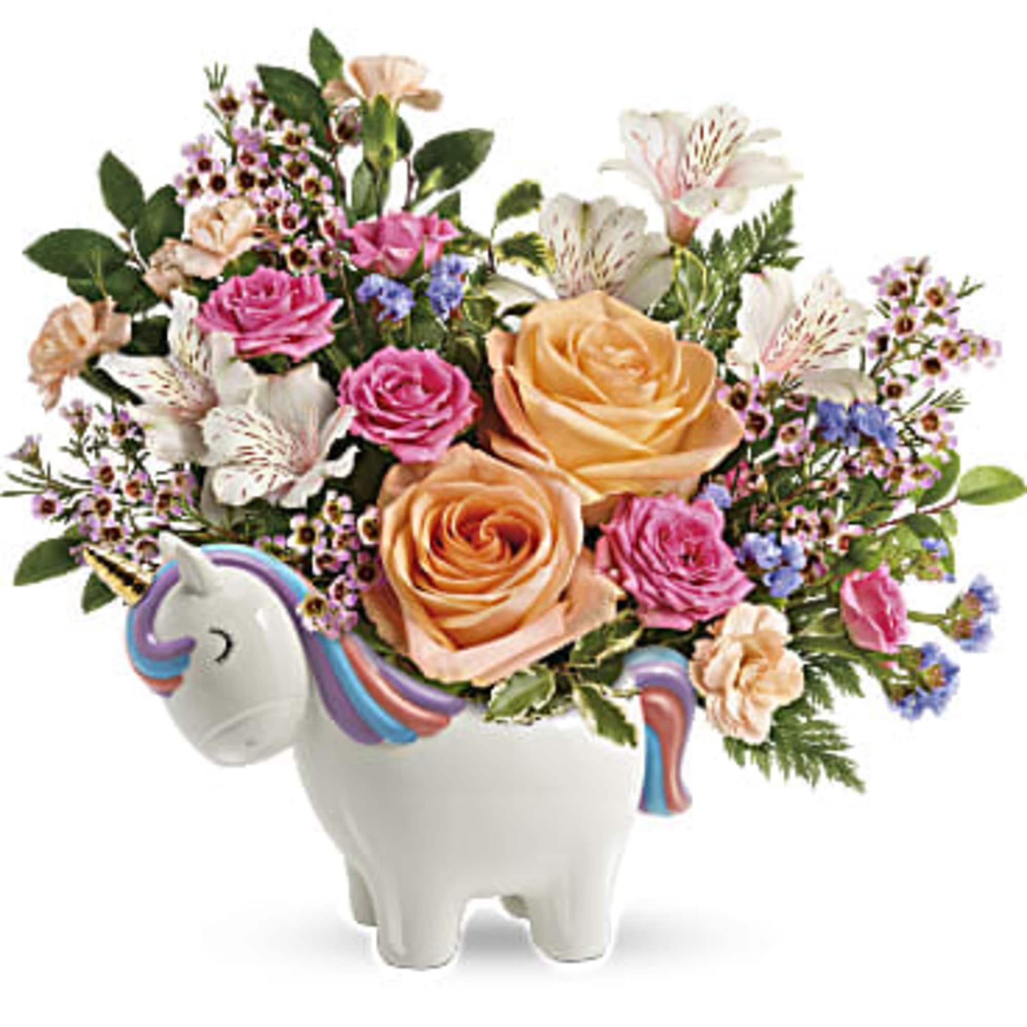 Make magic with this joyful gift of peach and pink roses, delicately