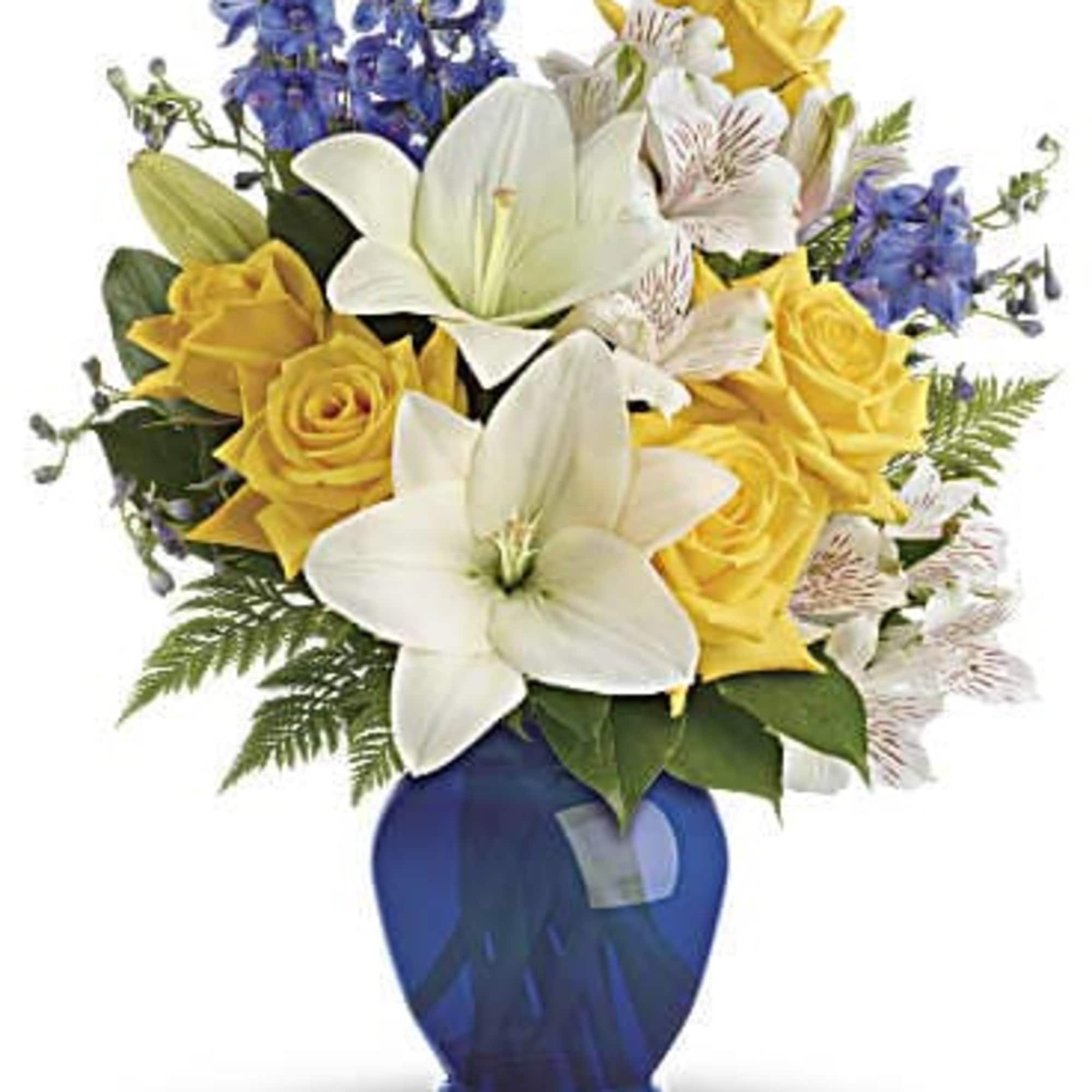 Like a sunny day at the shore, this bright bouquet invigorates and