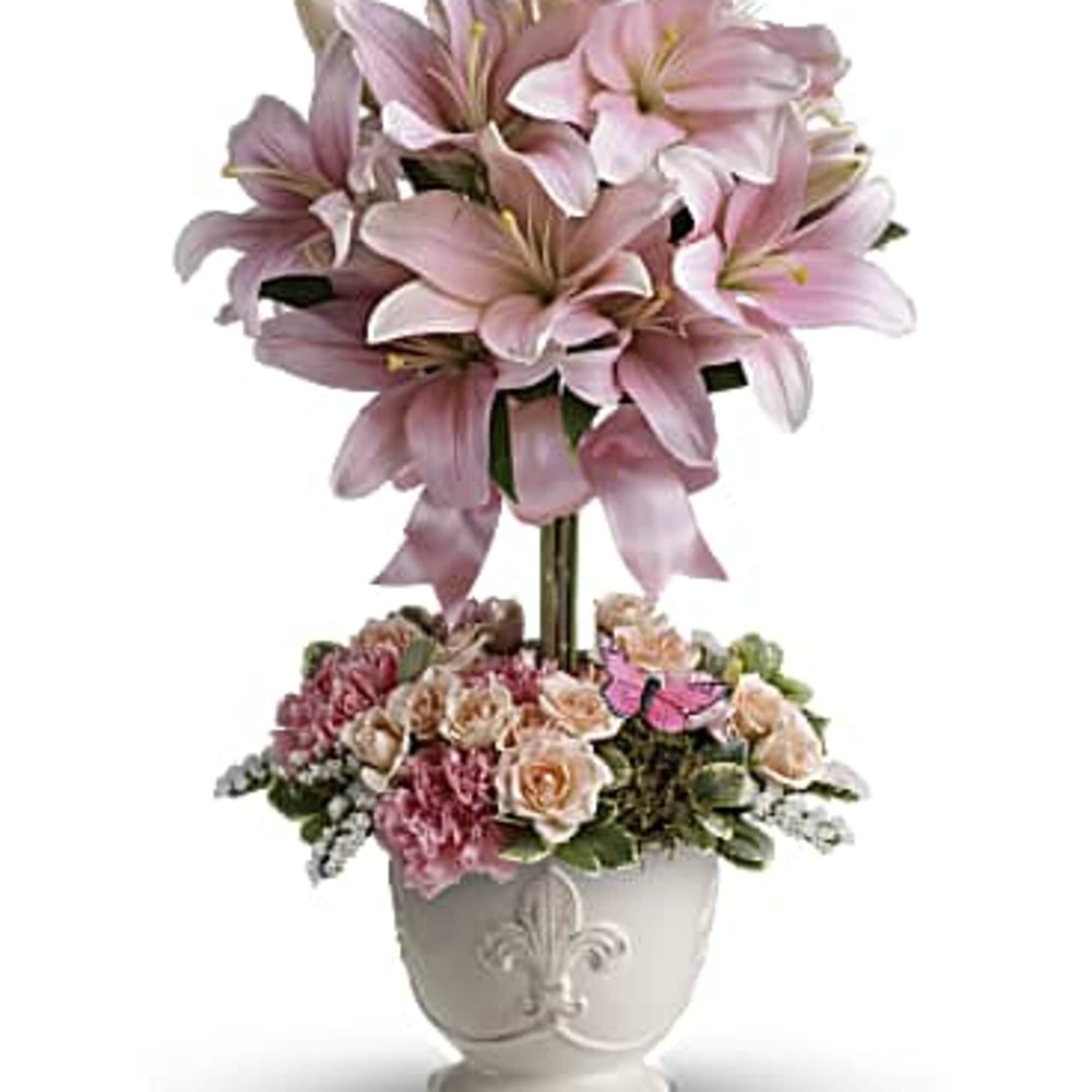 Send this blushing beauty of perfectly pink lilies and light pink carnations