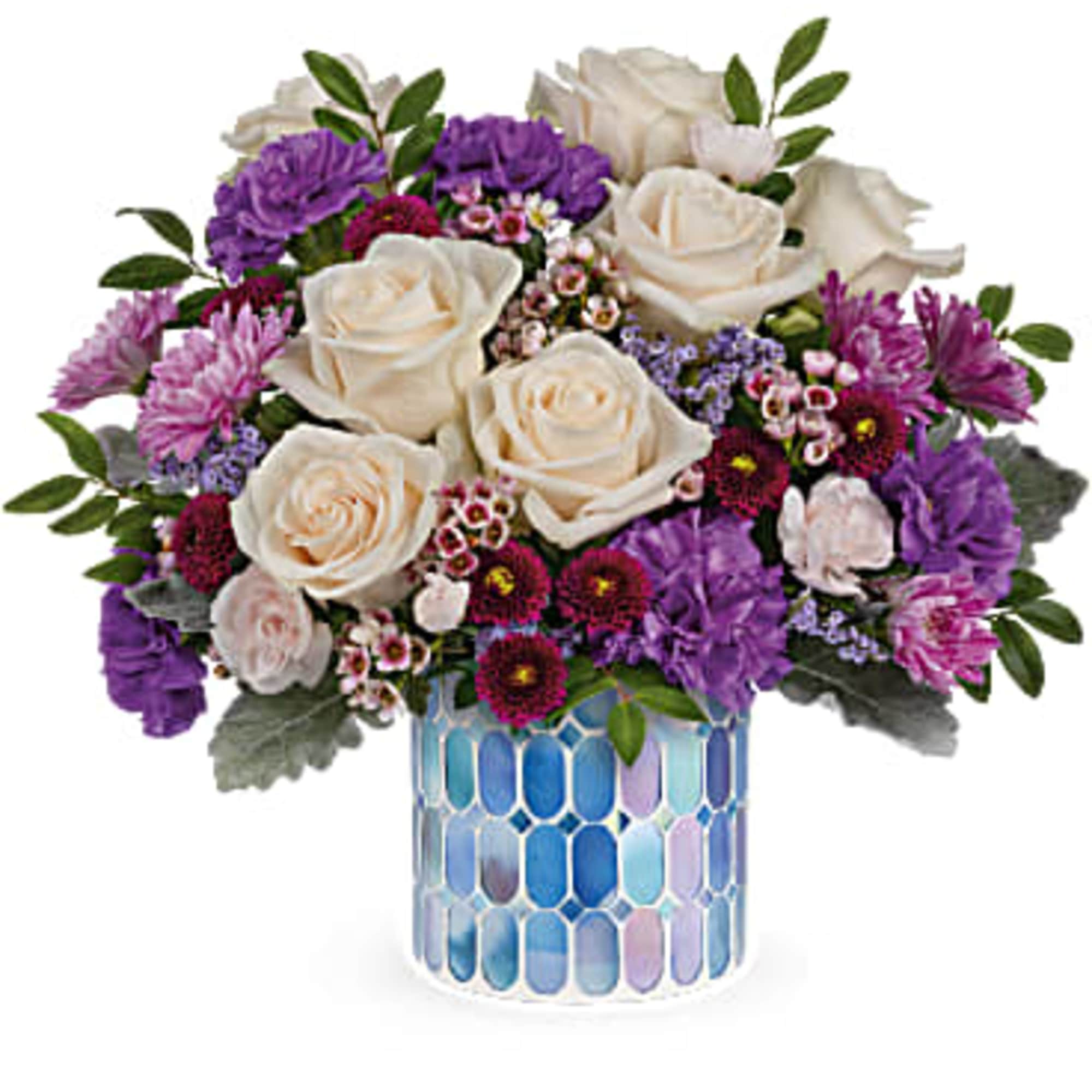 Springtime beauty at its best! Creamy roses and deep purple blooms are