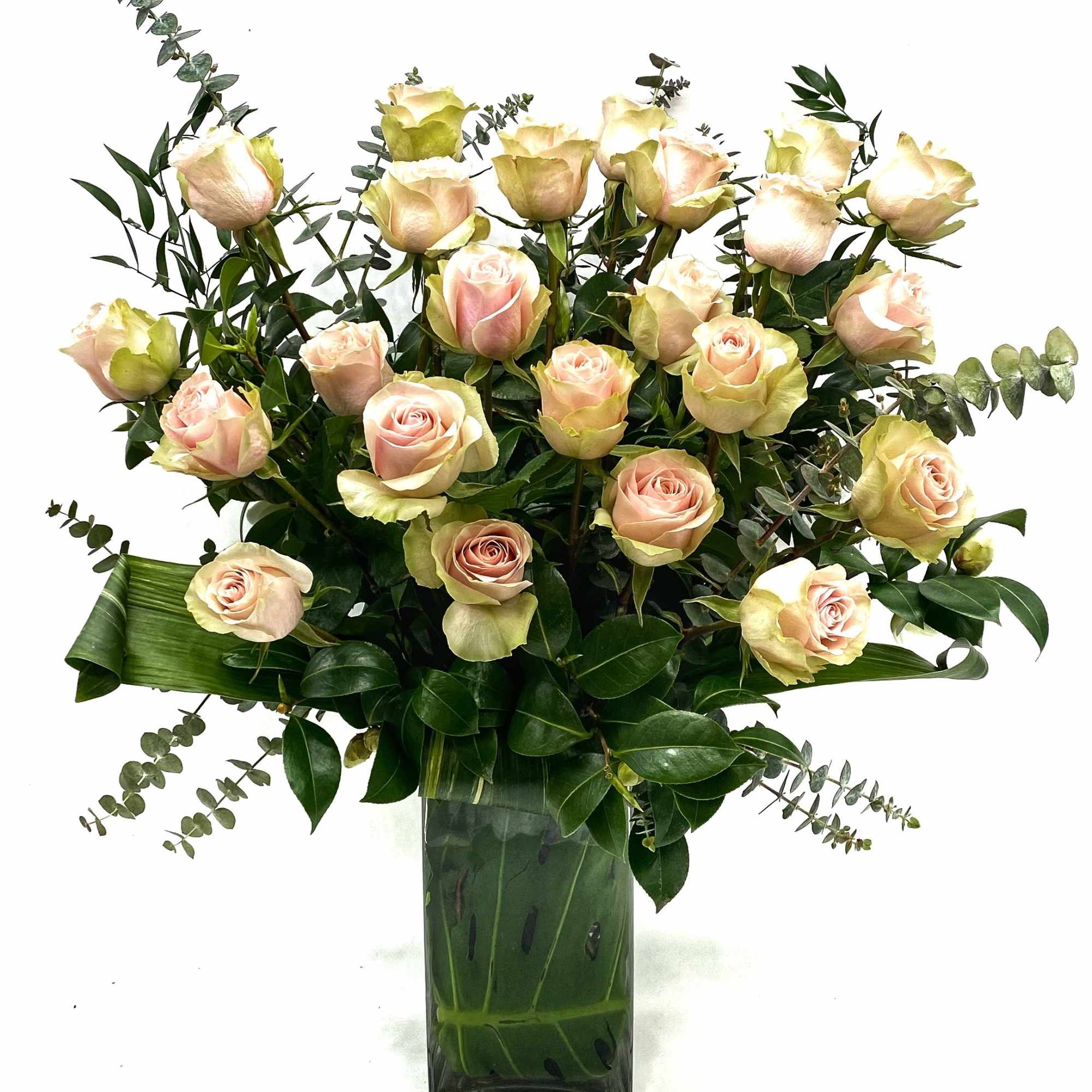 Our take on a classic arrangement of beautiful premium Soft Pink roses.
